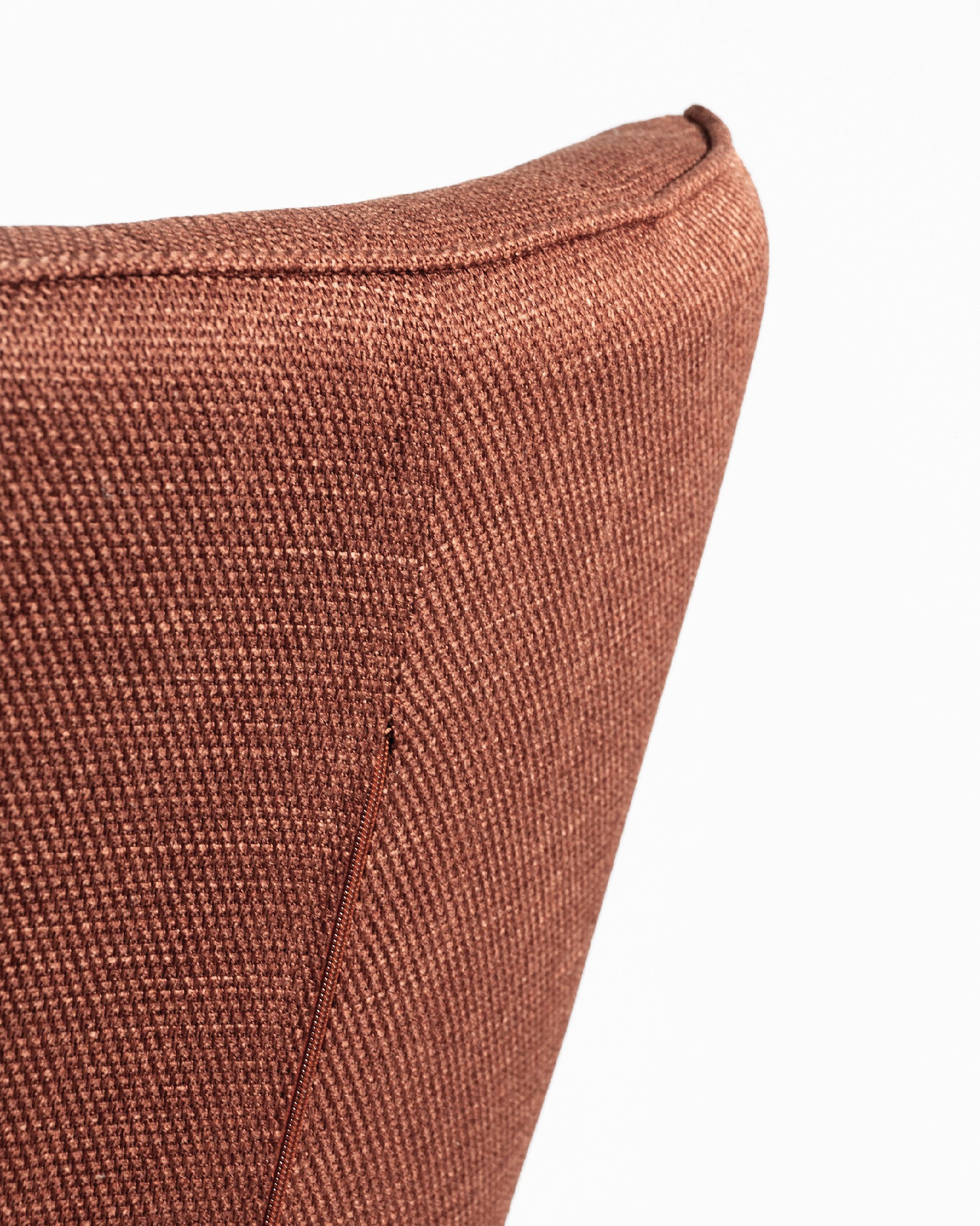 Iris swivel armchair with terracotta upholstery and black metal legs