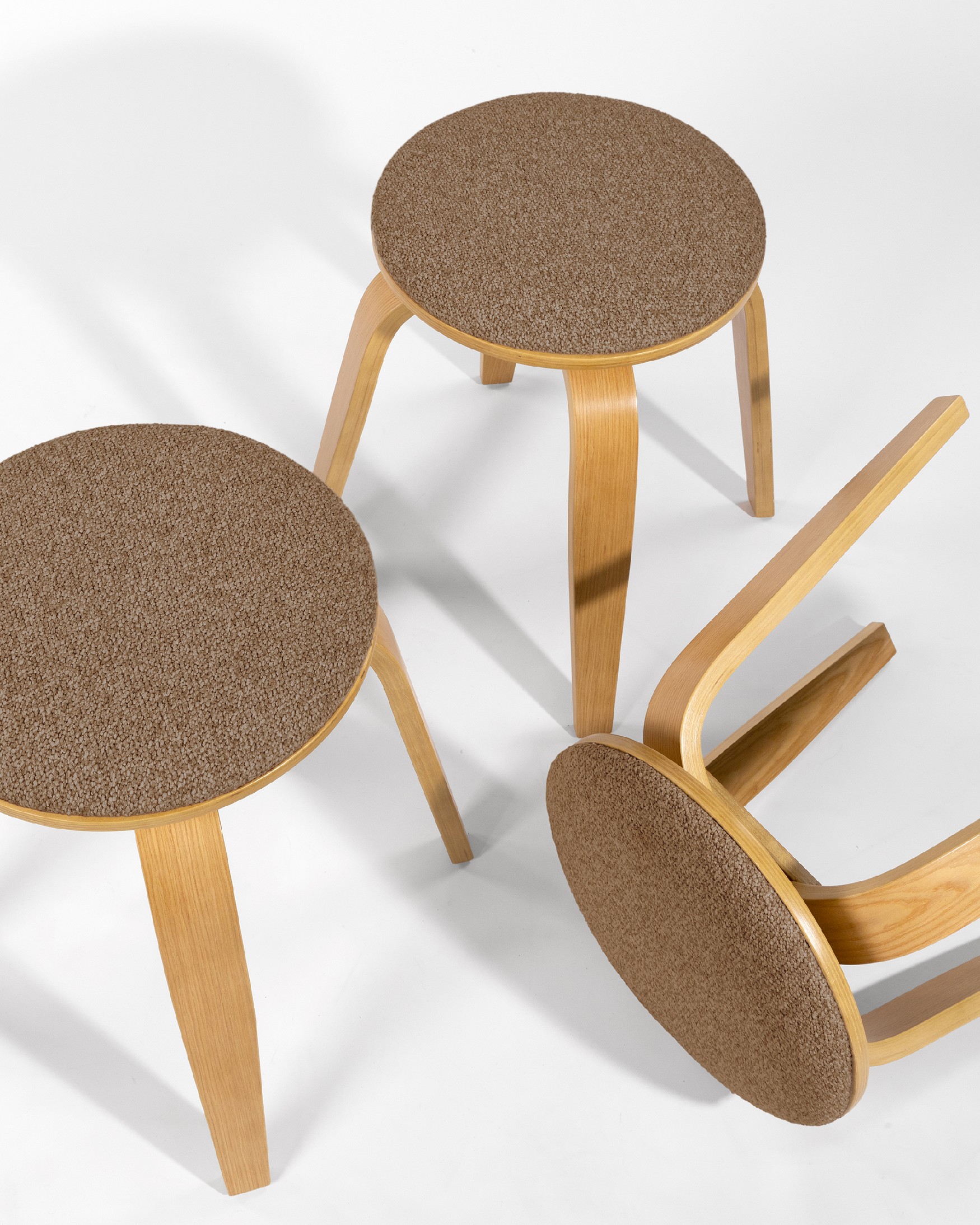 Low stool Jaco of wood swivel Jaco with brown upholstery