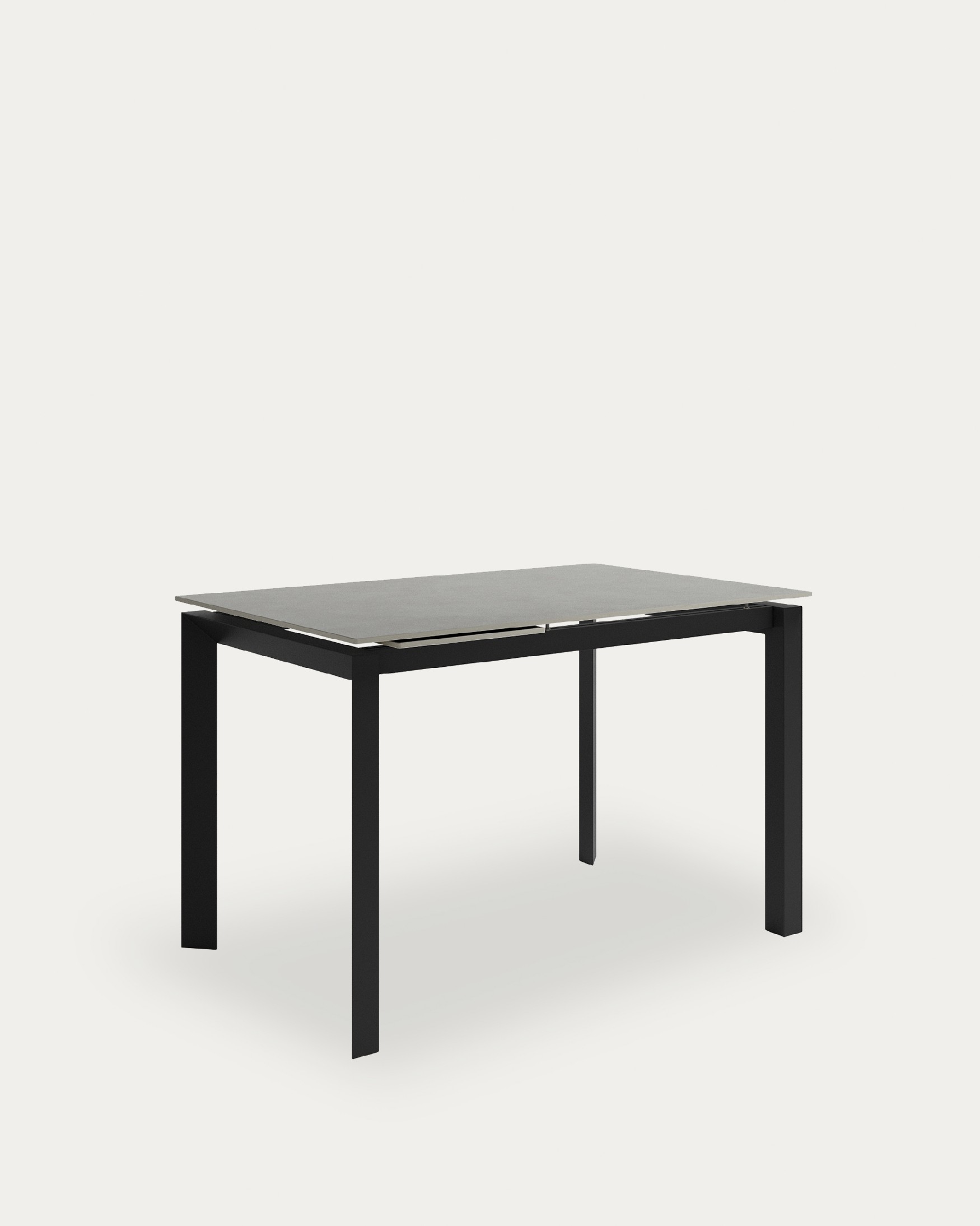 Table Júcar extensible avec finition porcelaine porland et structure métallique noire 140-190 x 90 cm
