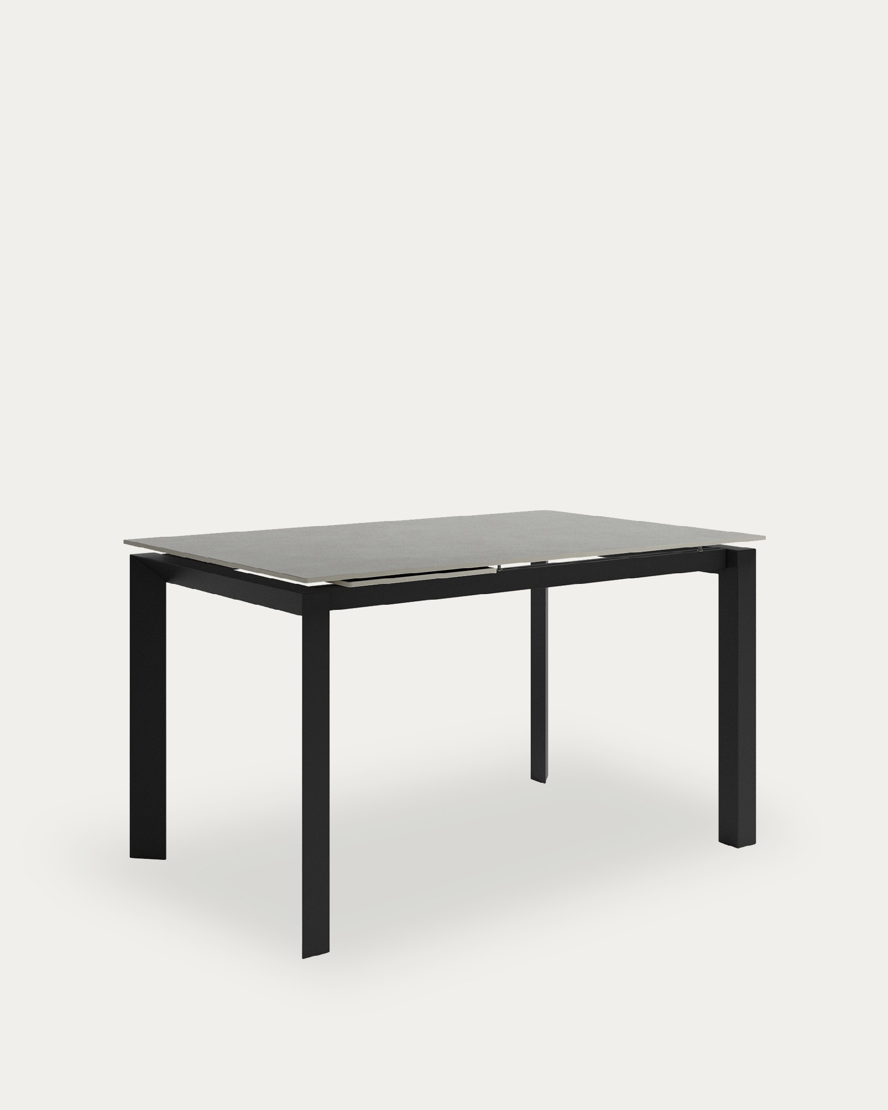 Table Júcar extensible avec finition porcelaine porland et structure métallique noire 160-210 x 90 cm