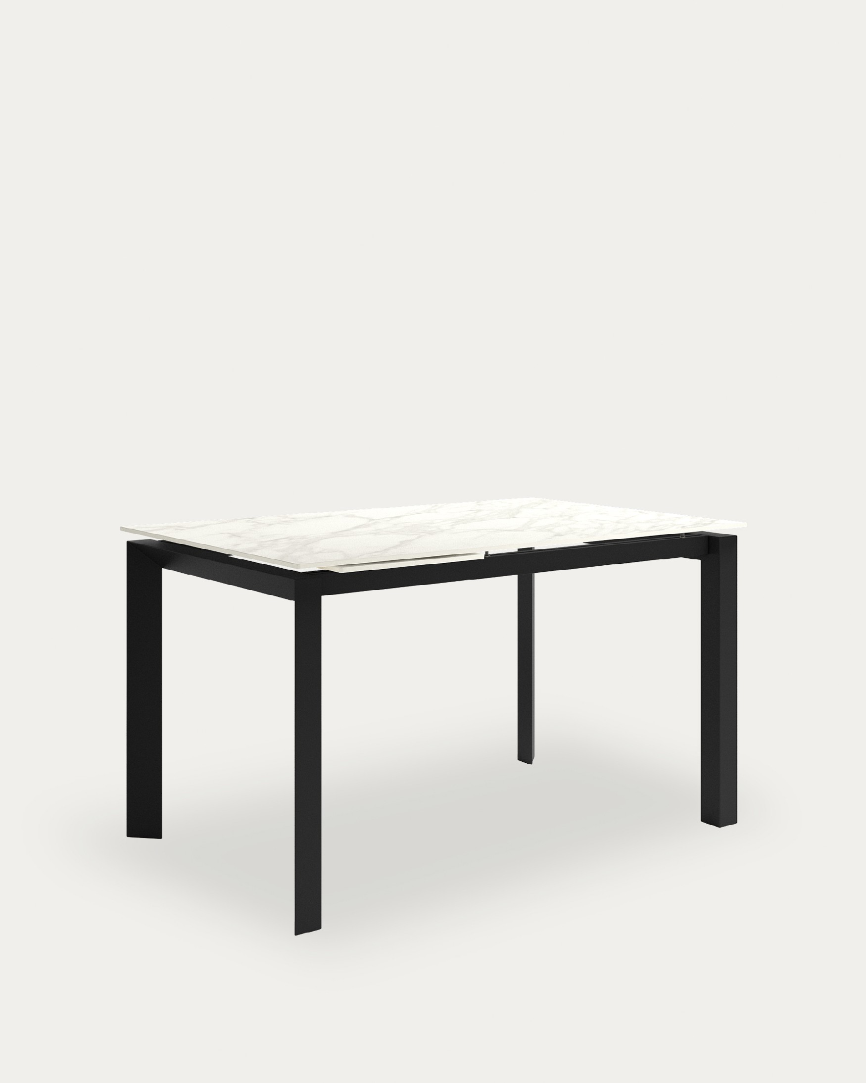 Table Júcar extensible avec finition porcelaine carrara et structure métallique noire 160-210 x 90 cm