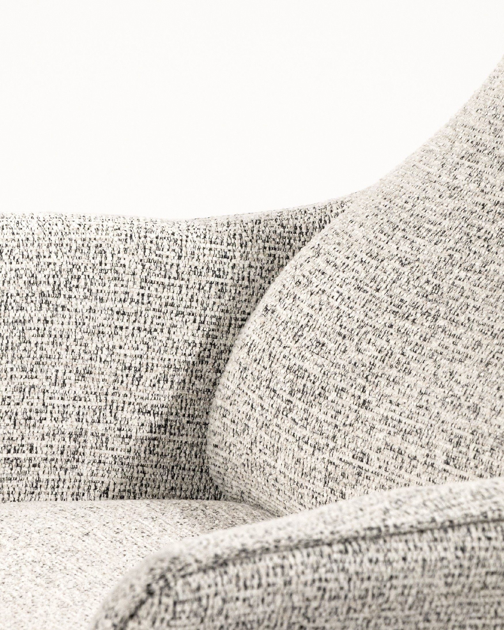 Kiara manual rotating relax armchair with speckled upholstery and black metal leg. With ottoman.