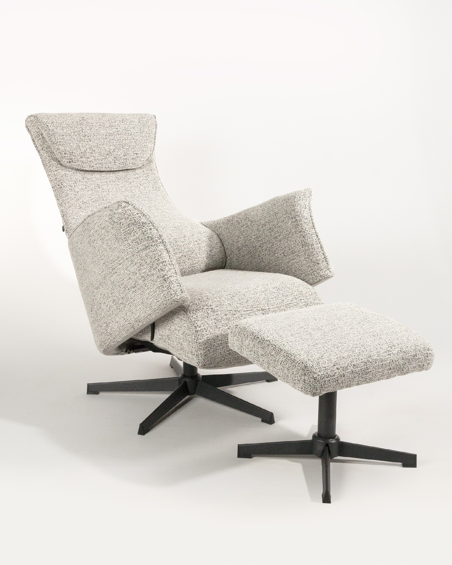 Kiara manual rotating relax armchair with speckled upholstery and black metal leg. With ottoman.