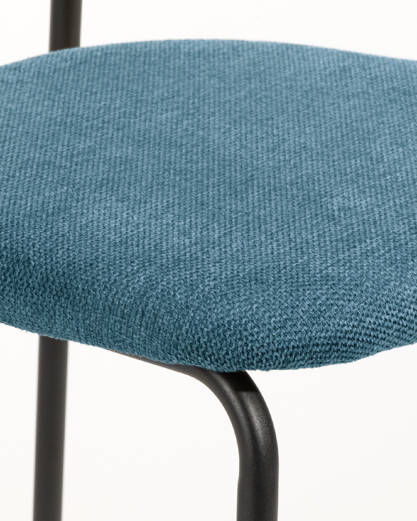 Kobe chair with blue upholstery and black metal legs