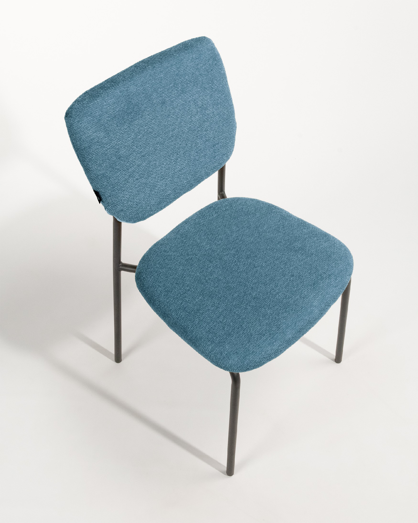 Kobe chair with blue upholstery and black metal legs