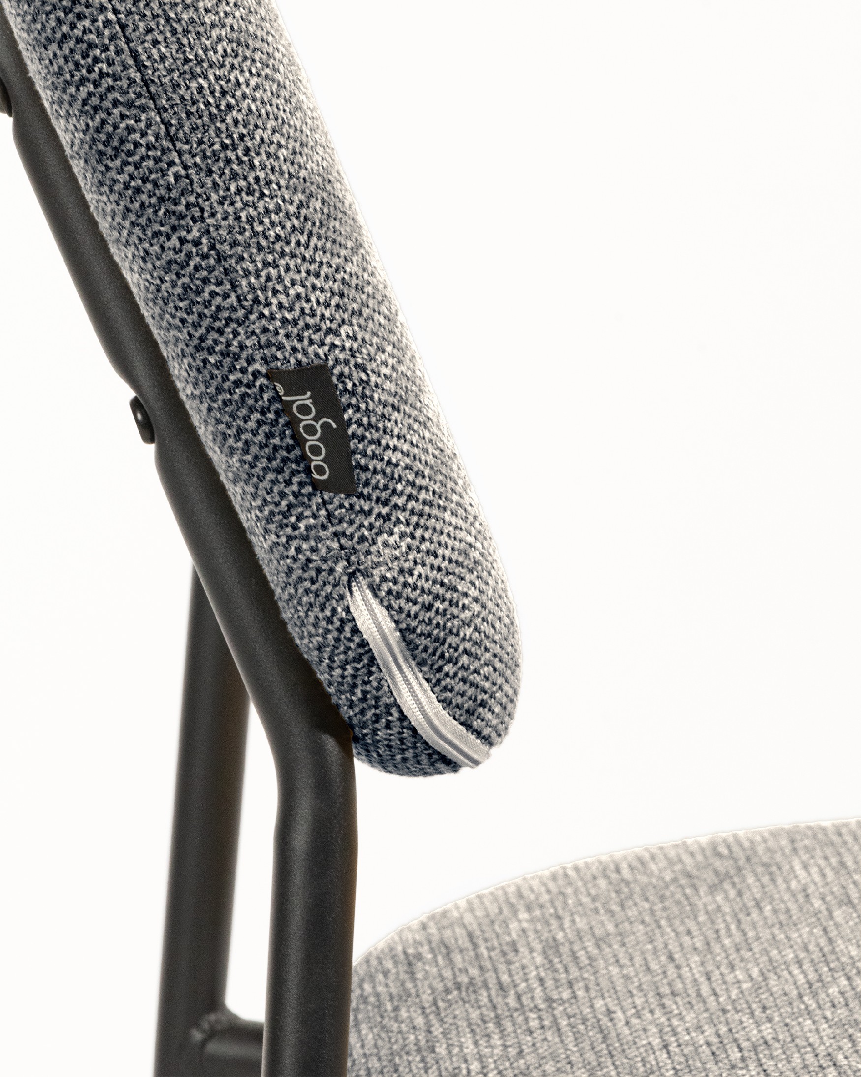 Kobe chair with gray upholstery and black metal legs