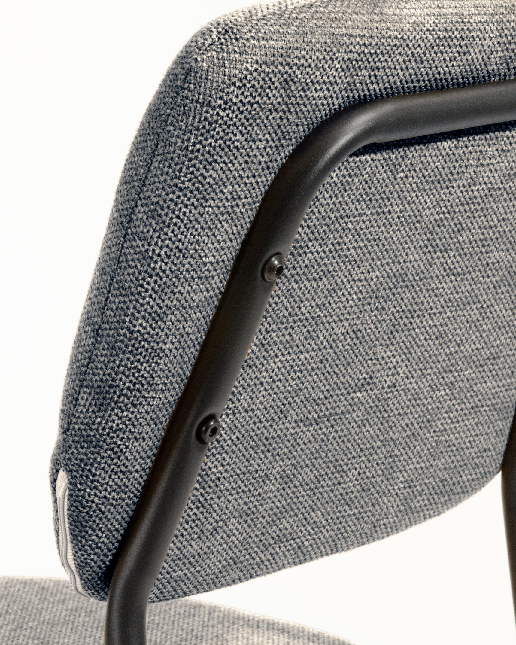 Kobe chair with gray upholstery and black metal legs