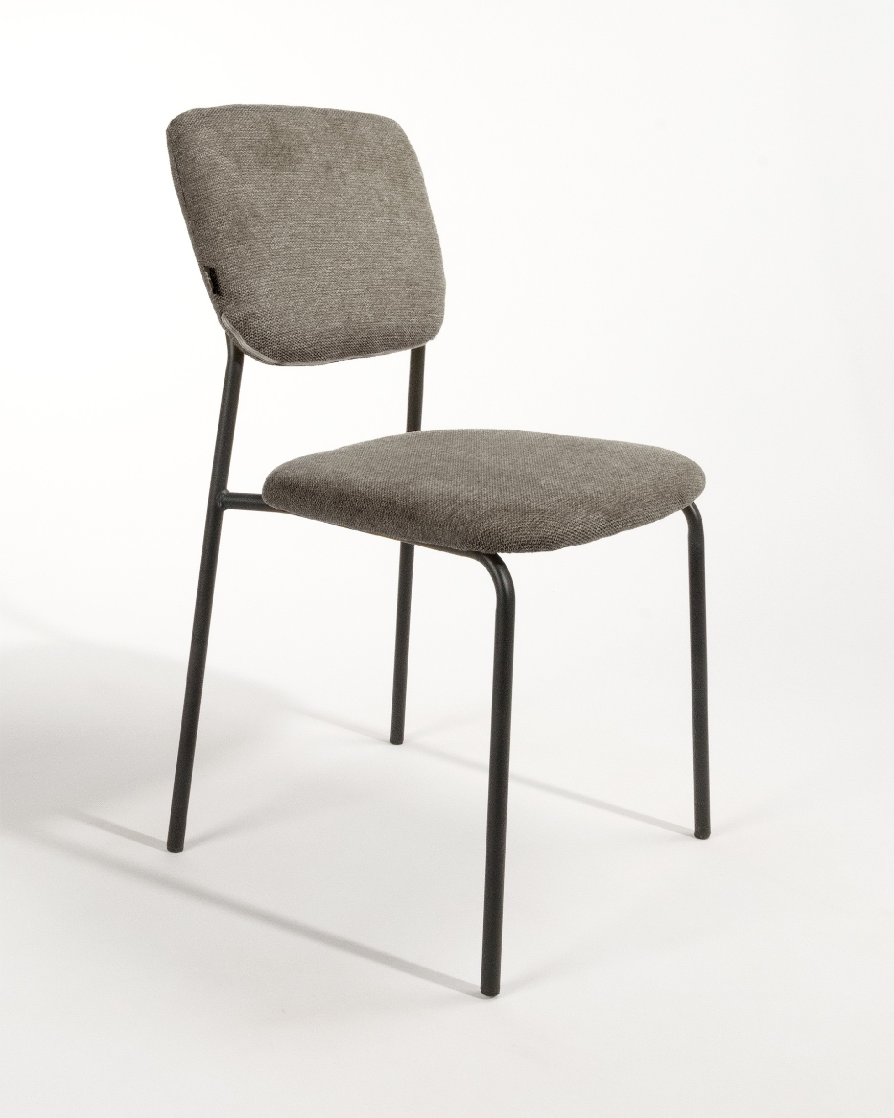 Kobe chair with brown upholstery and black metal legs