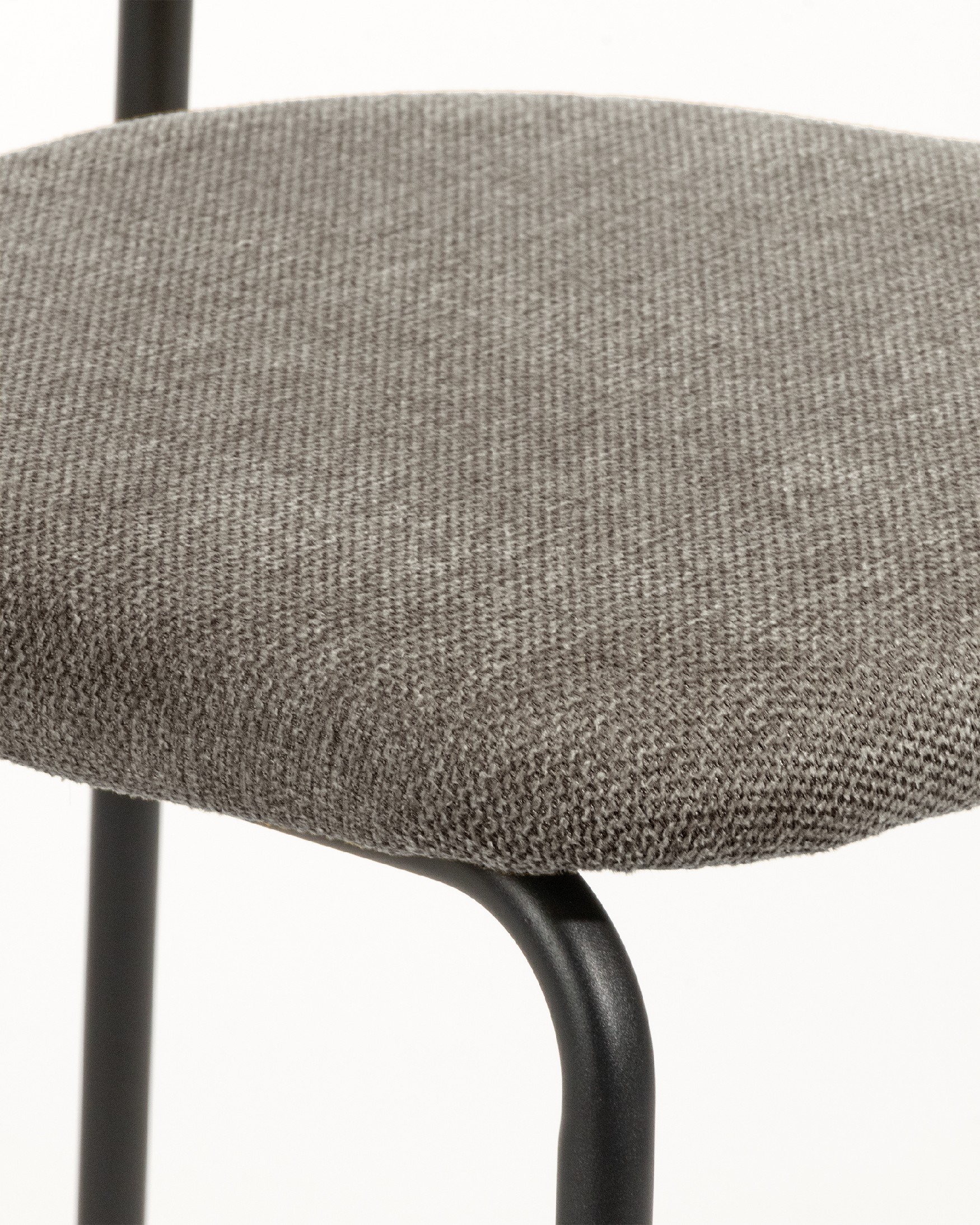 Kobe chair with brown upholstery and black metal legs