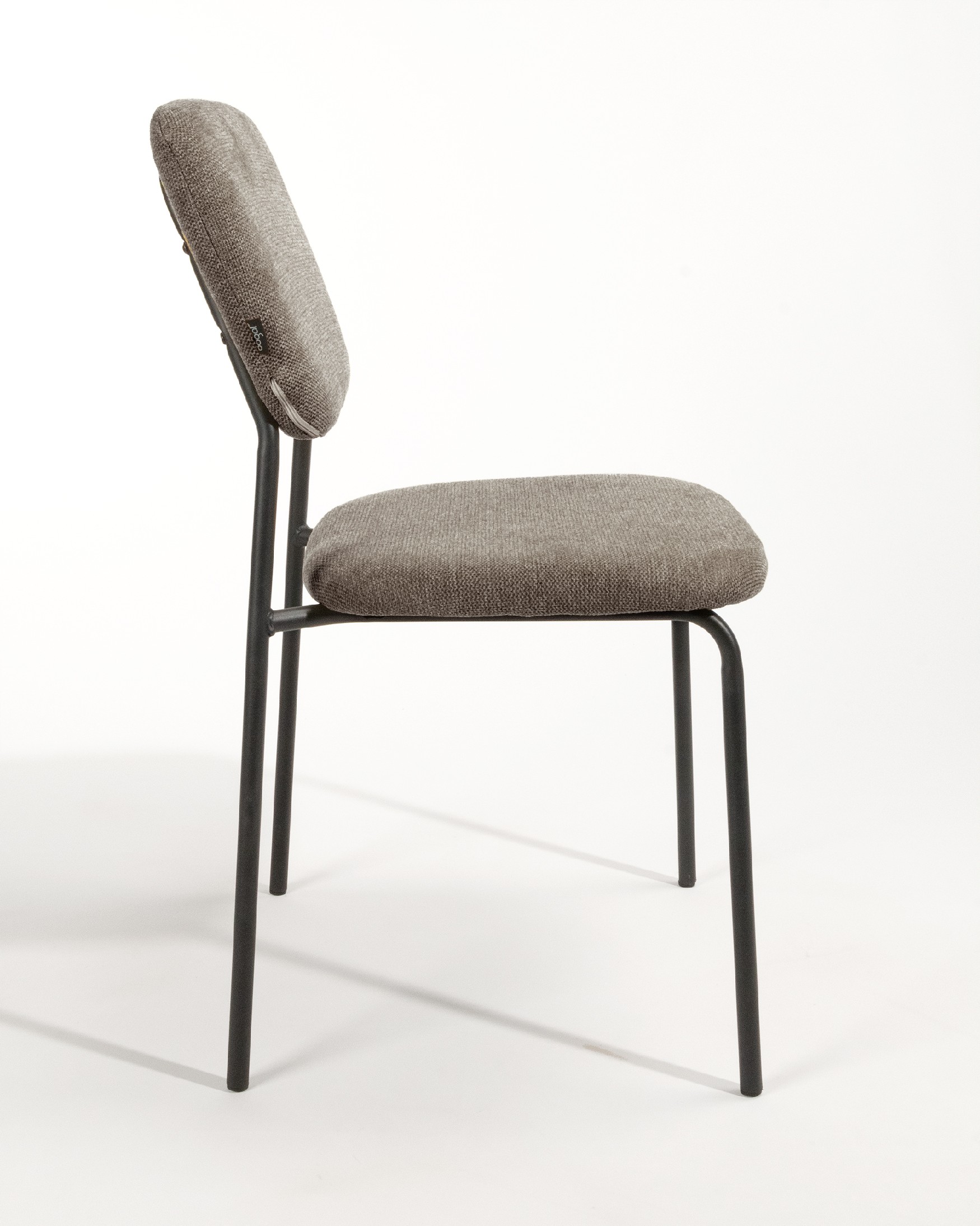 Kobe chair with brown upholstery and black metal legs