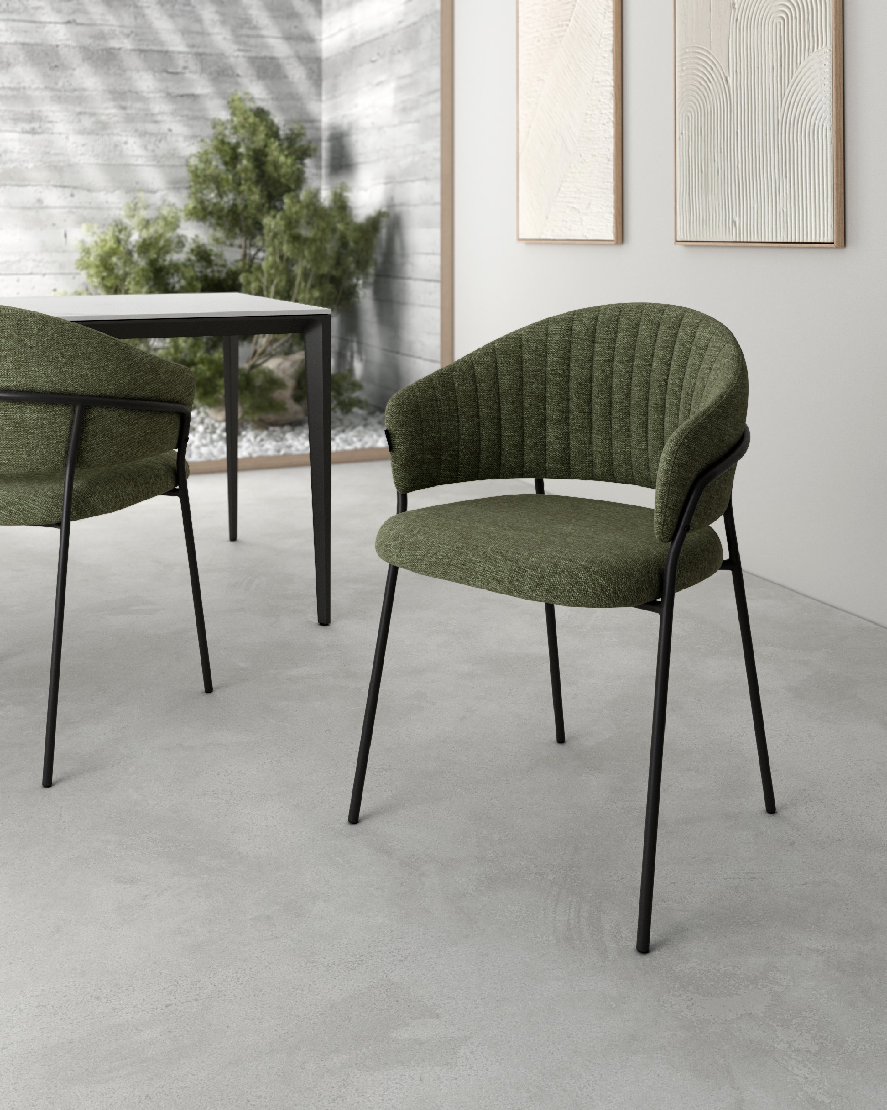 Chaise Kyoto avec un revêtement vert et des pieds métalliques noirs