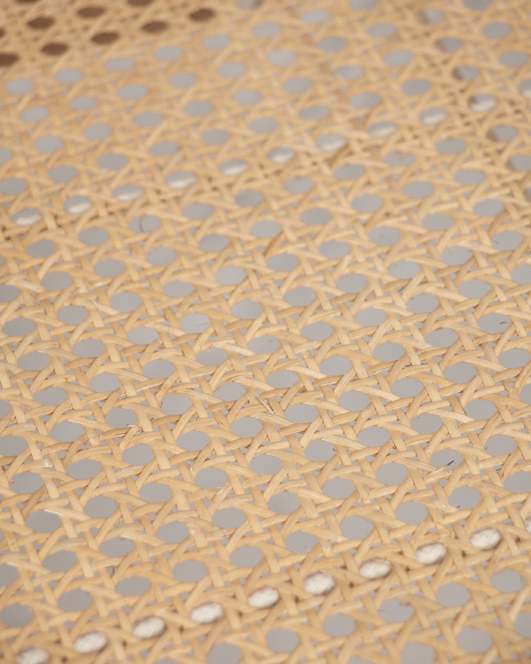 Liria armchair made of rattan with a natural ash finish