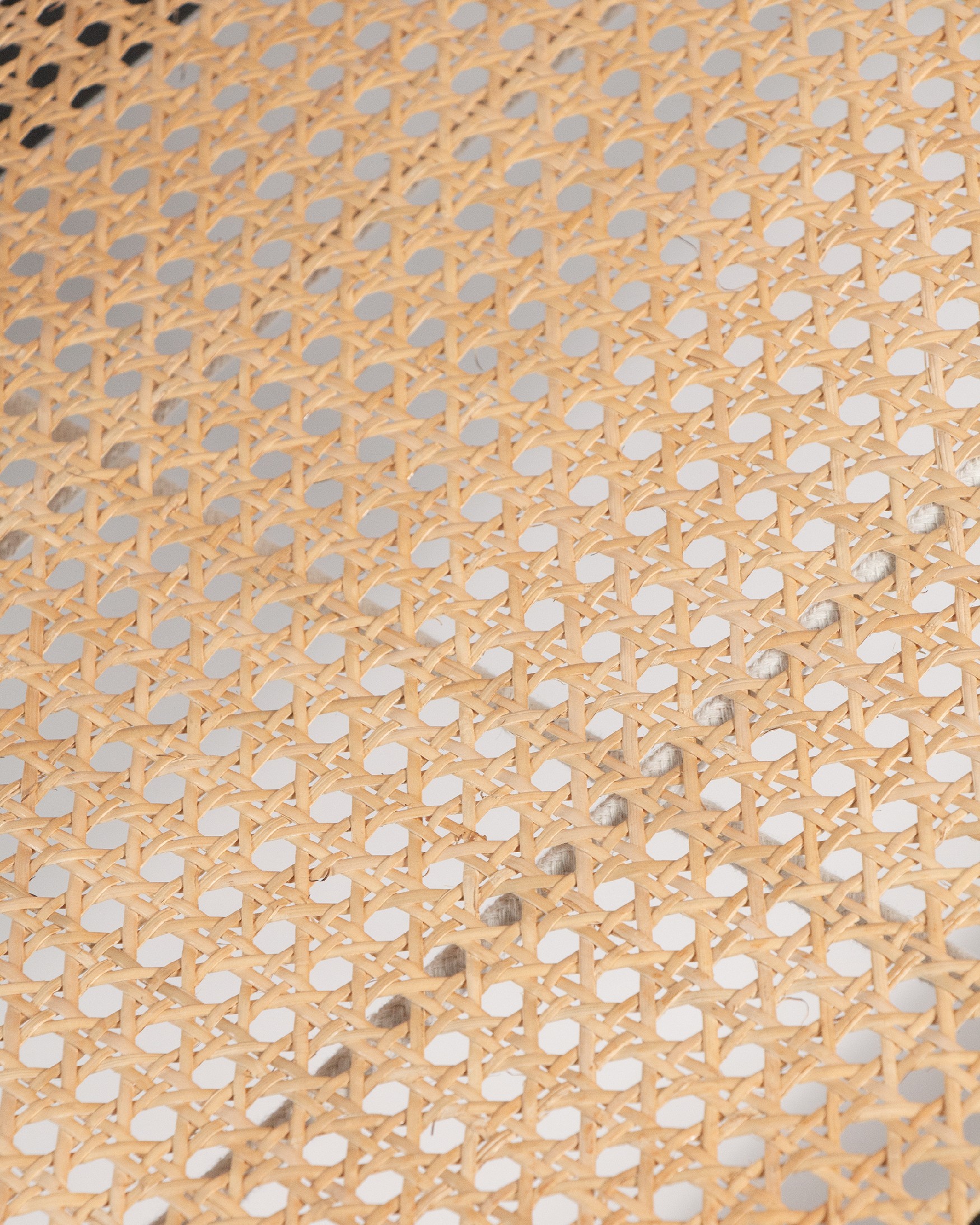 Liria armchair made of rattan with a black ash finish