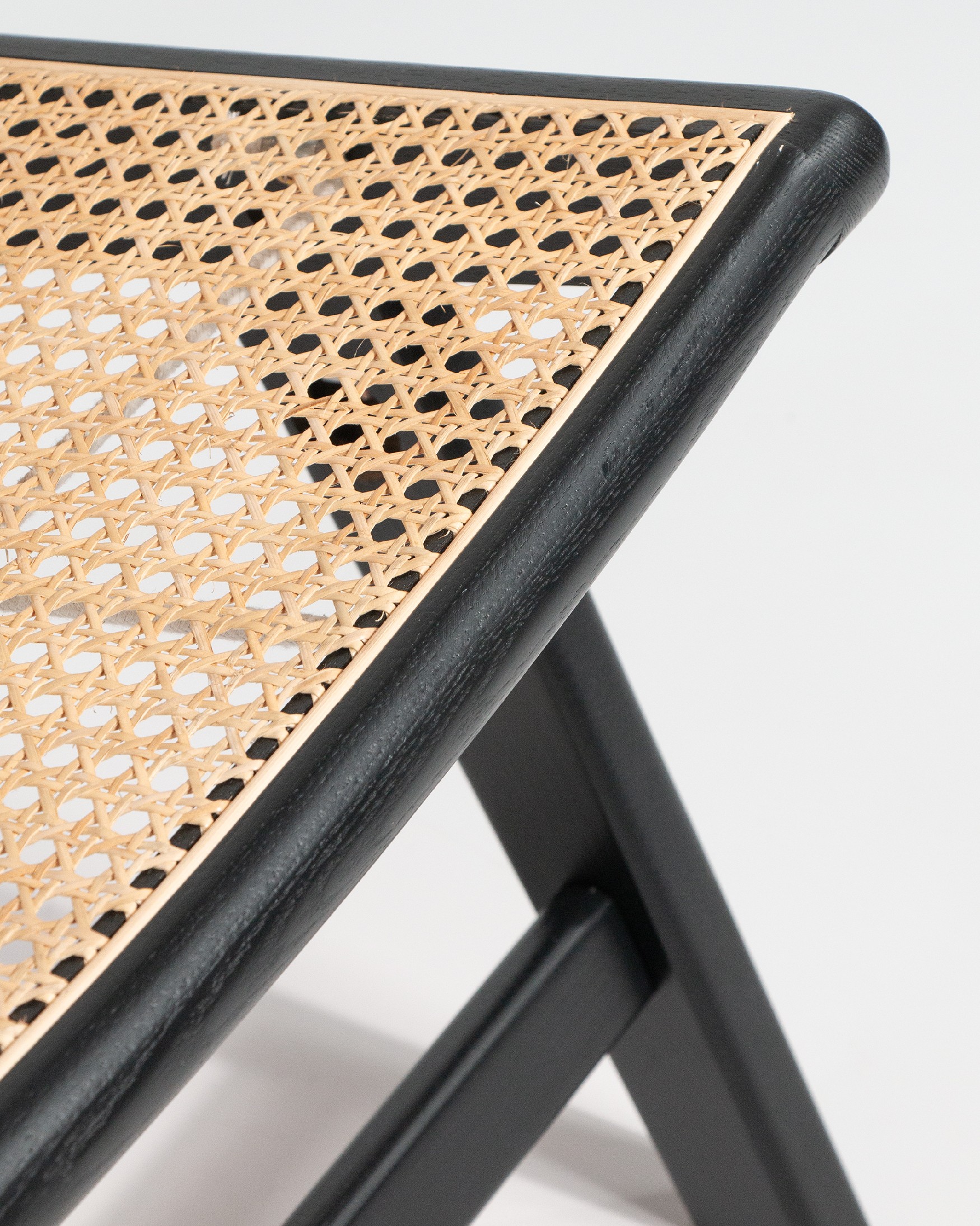 Liria armchair made of rattan with a black ash finish