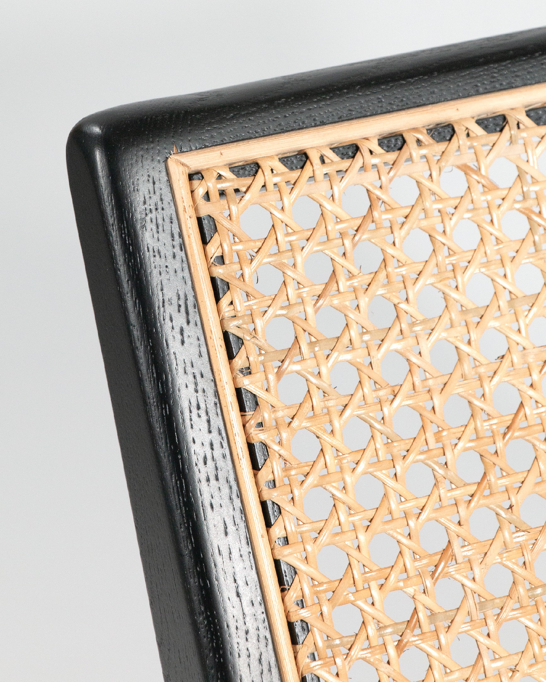 Liria armchair made of rattan with a black ash finish