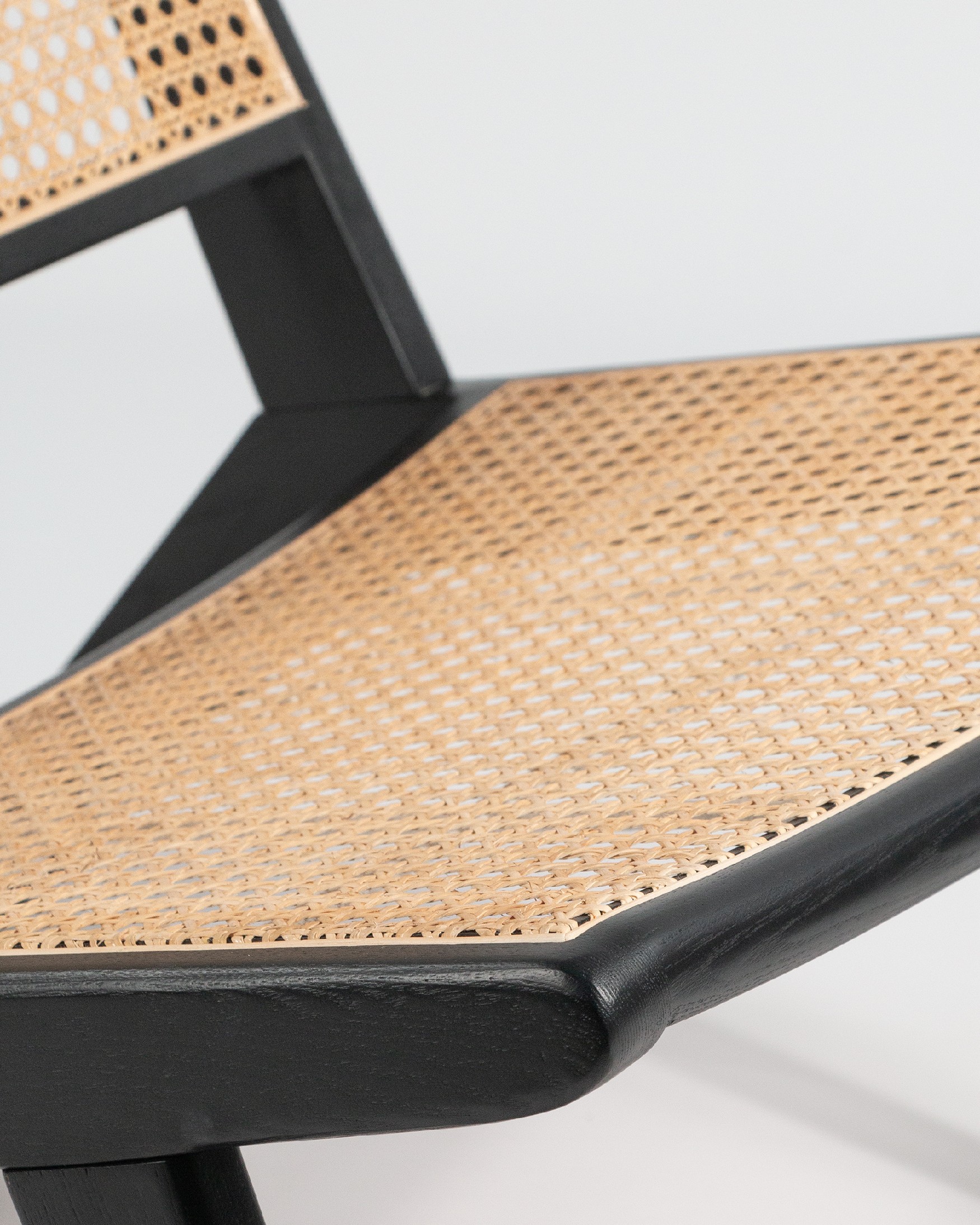 Liria armchair made of rattan with a black ash finish