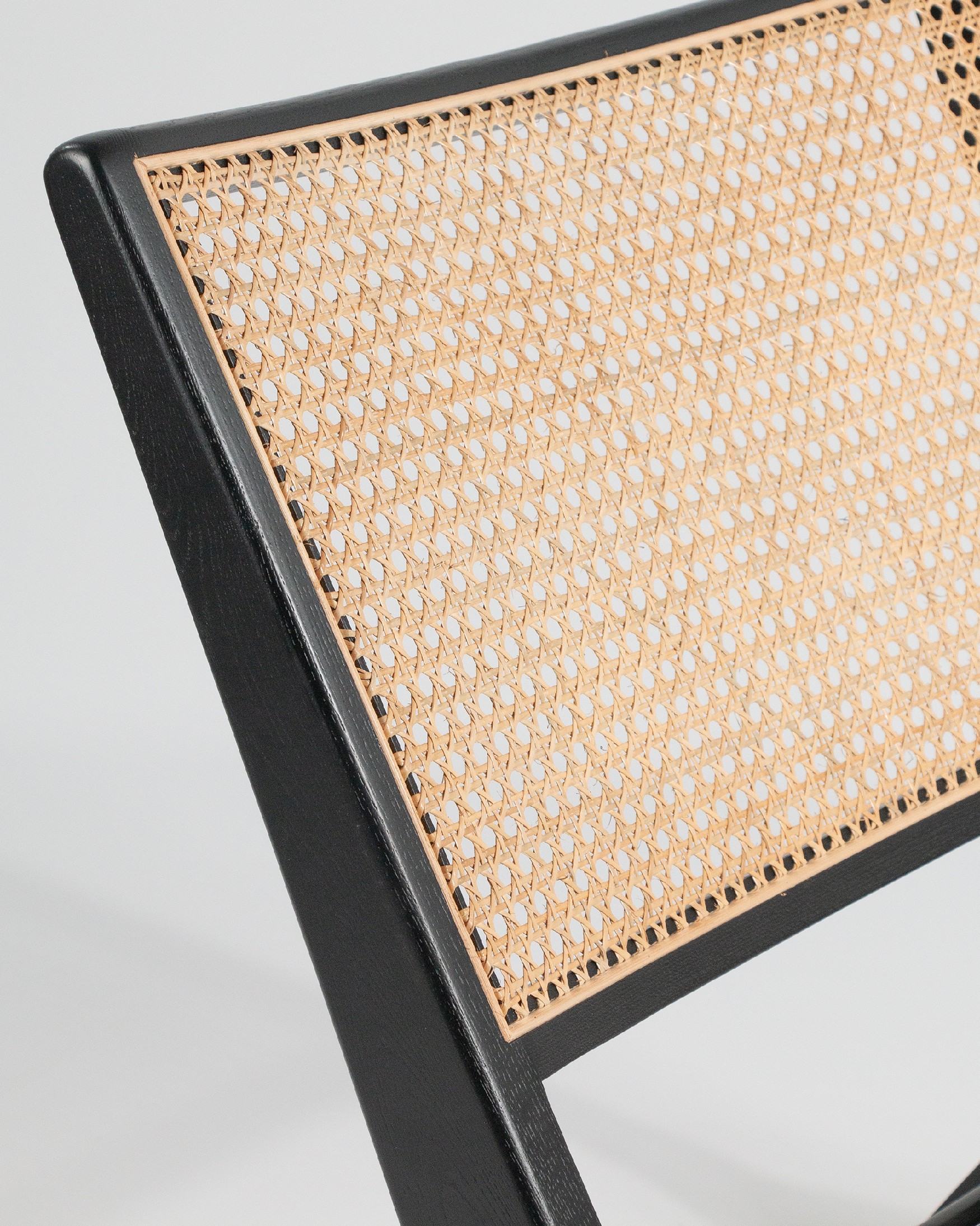 Liria armchair made of rattan with a black ash finish