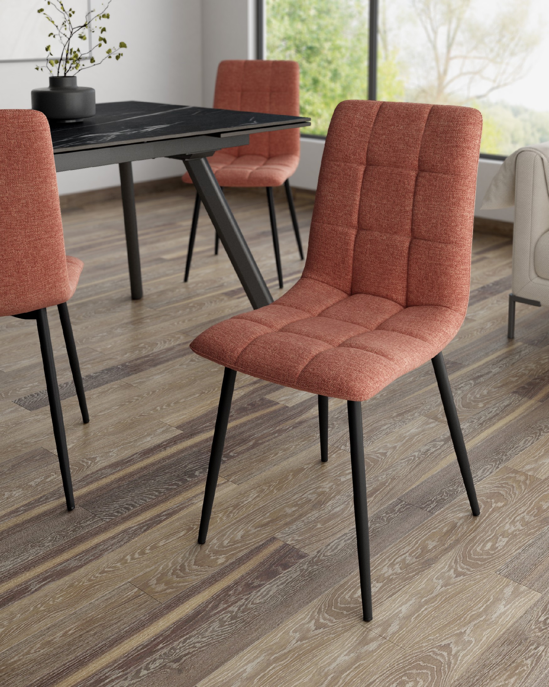 Lisbon chair with salmon upholstery and black metal legs