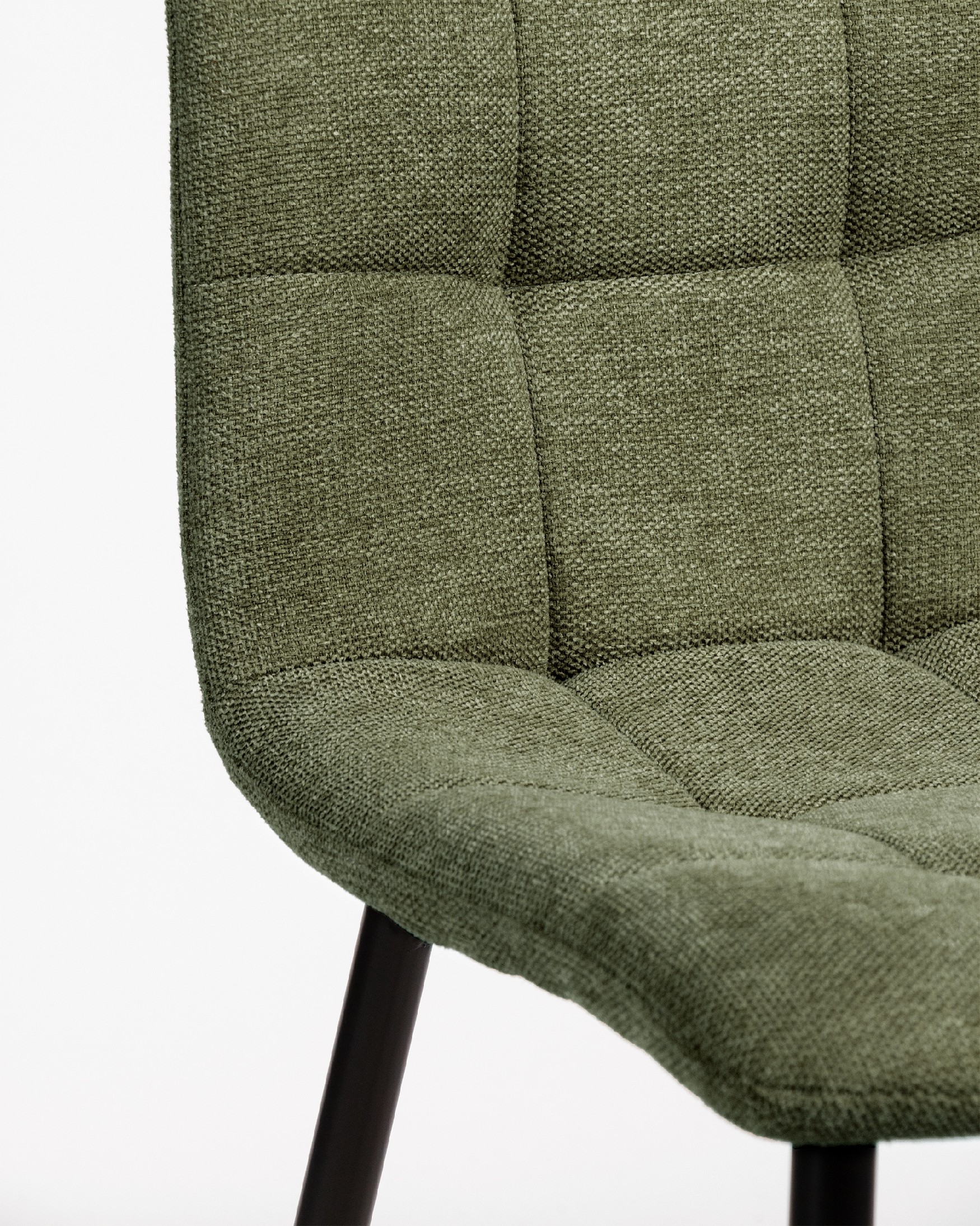 Lisbon chair with green upholstery and black metal legs