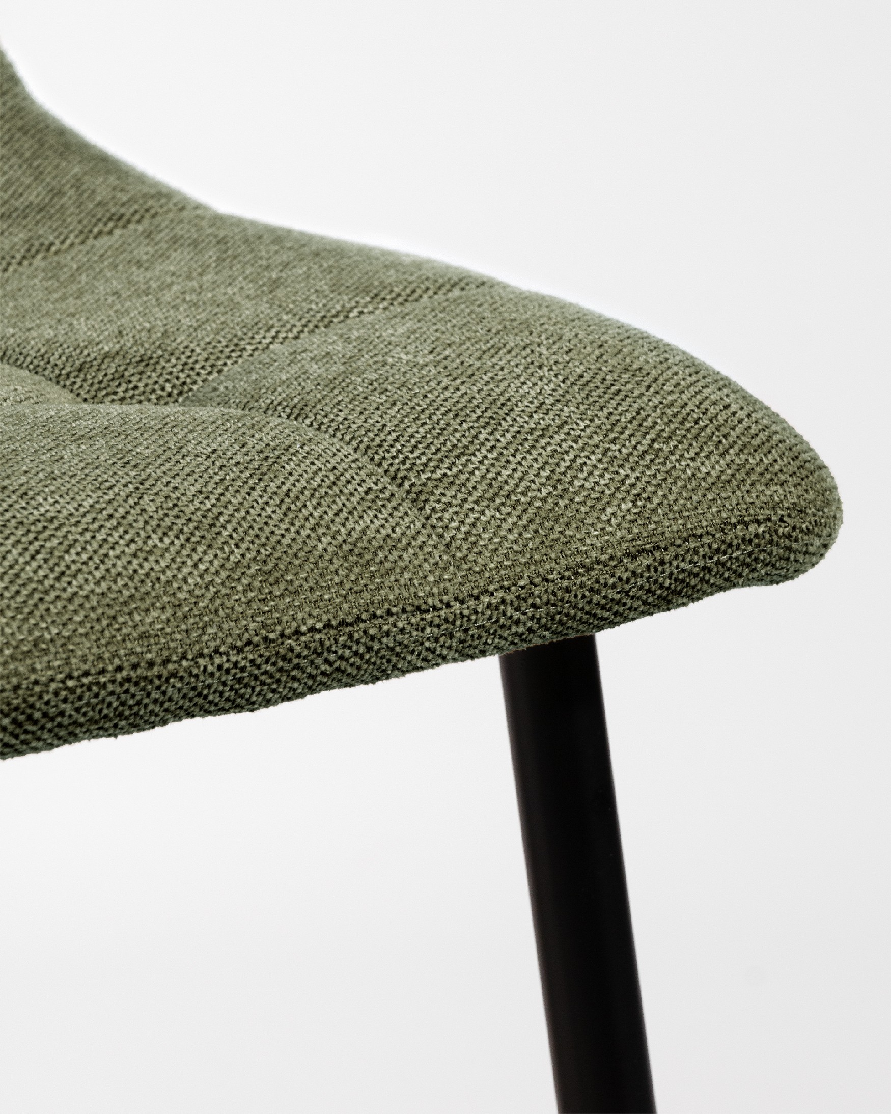 Lisbon chair with green upholstery and black metal legs