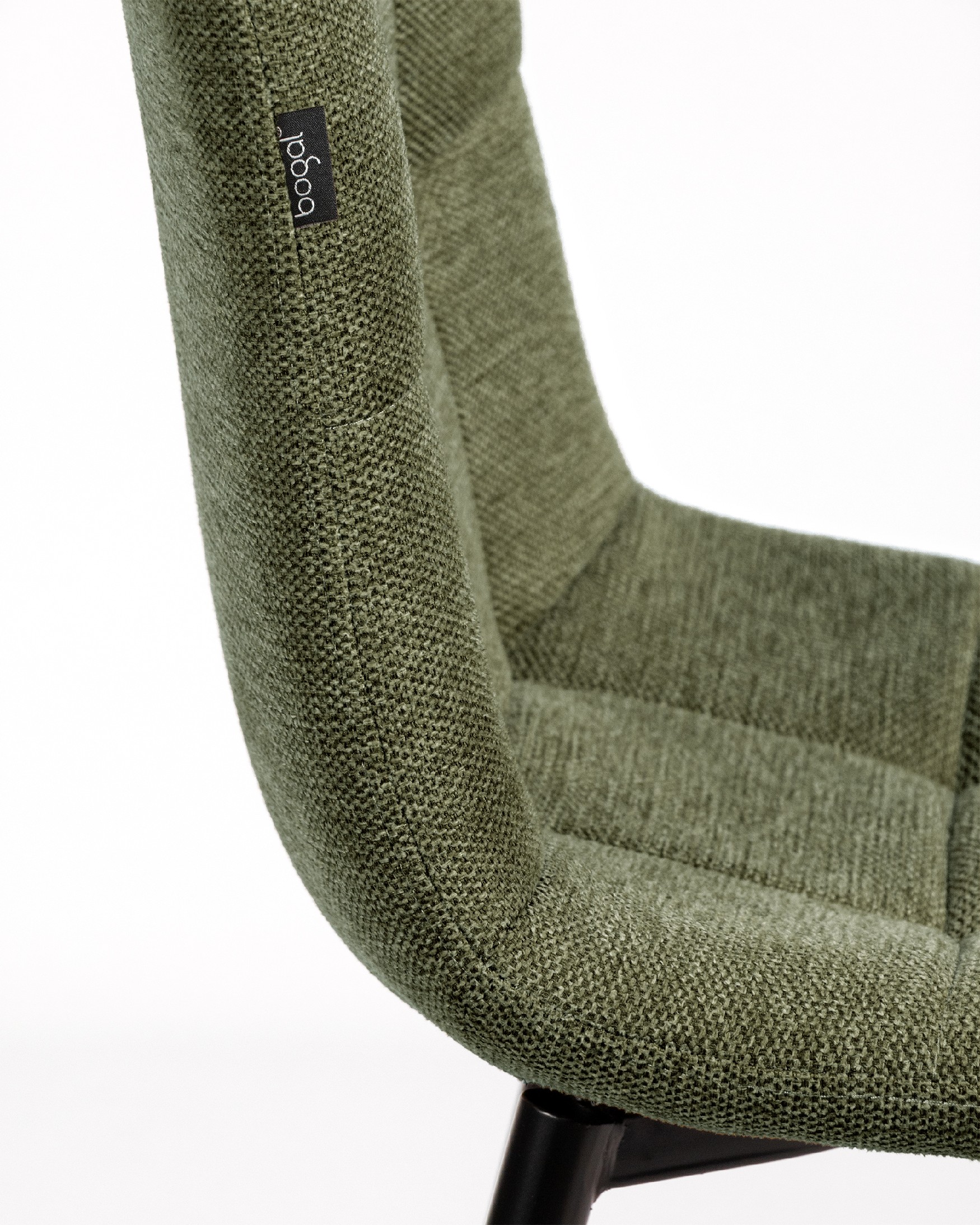 Lisbon chair with green upholstery and black metal legs