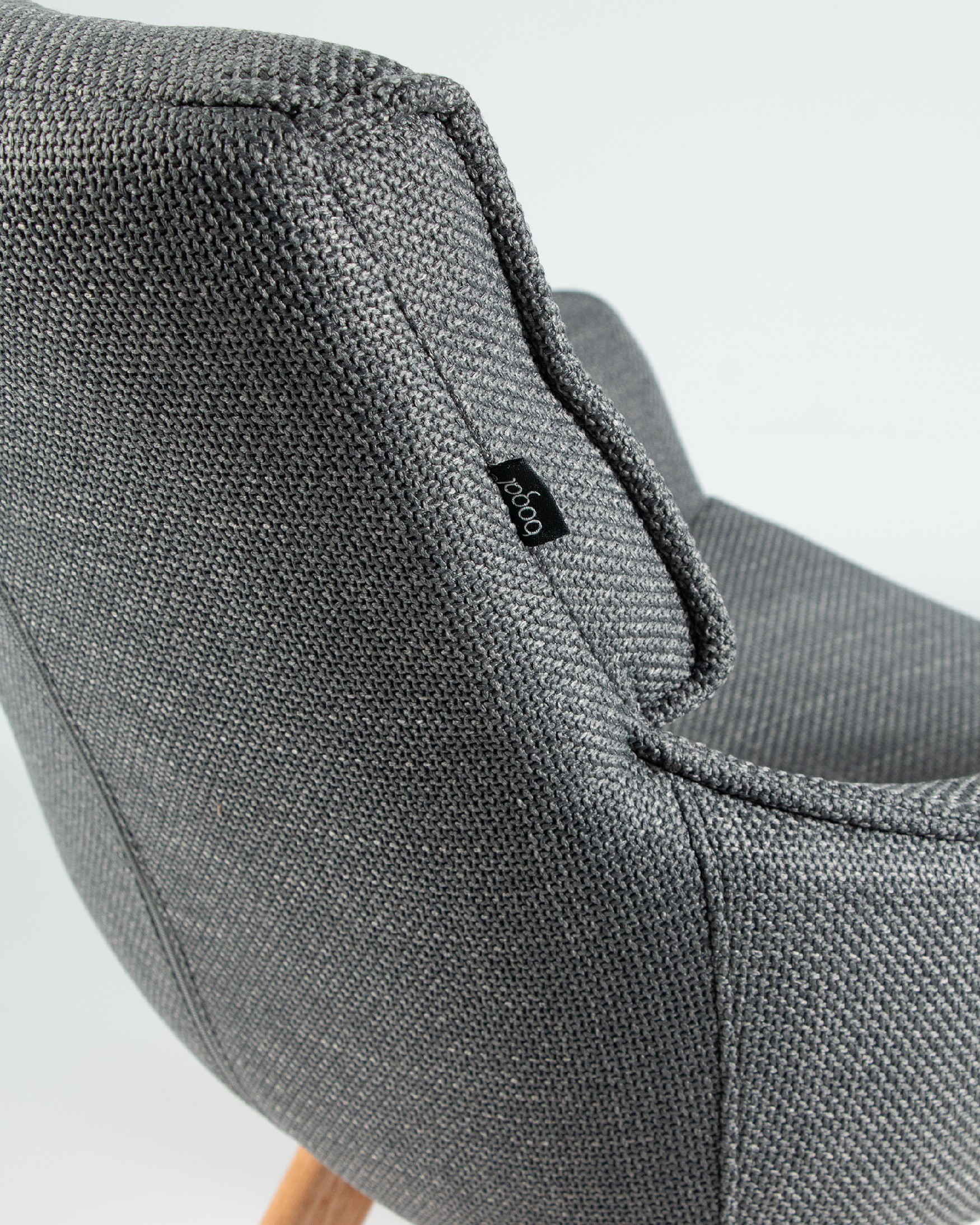 Liverpool chair with gray upholstery and wooden legs