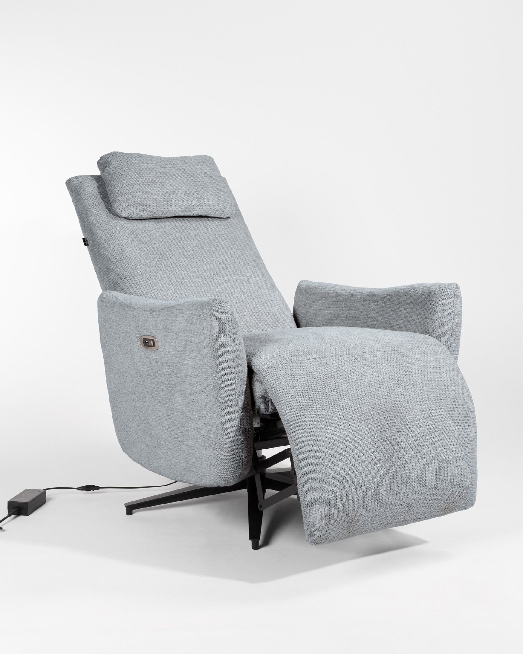 Megan electric swivel recliner with gray upholstery and black metal base