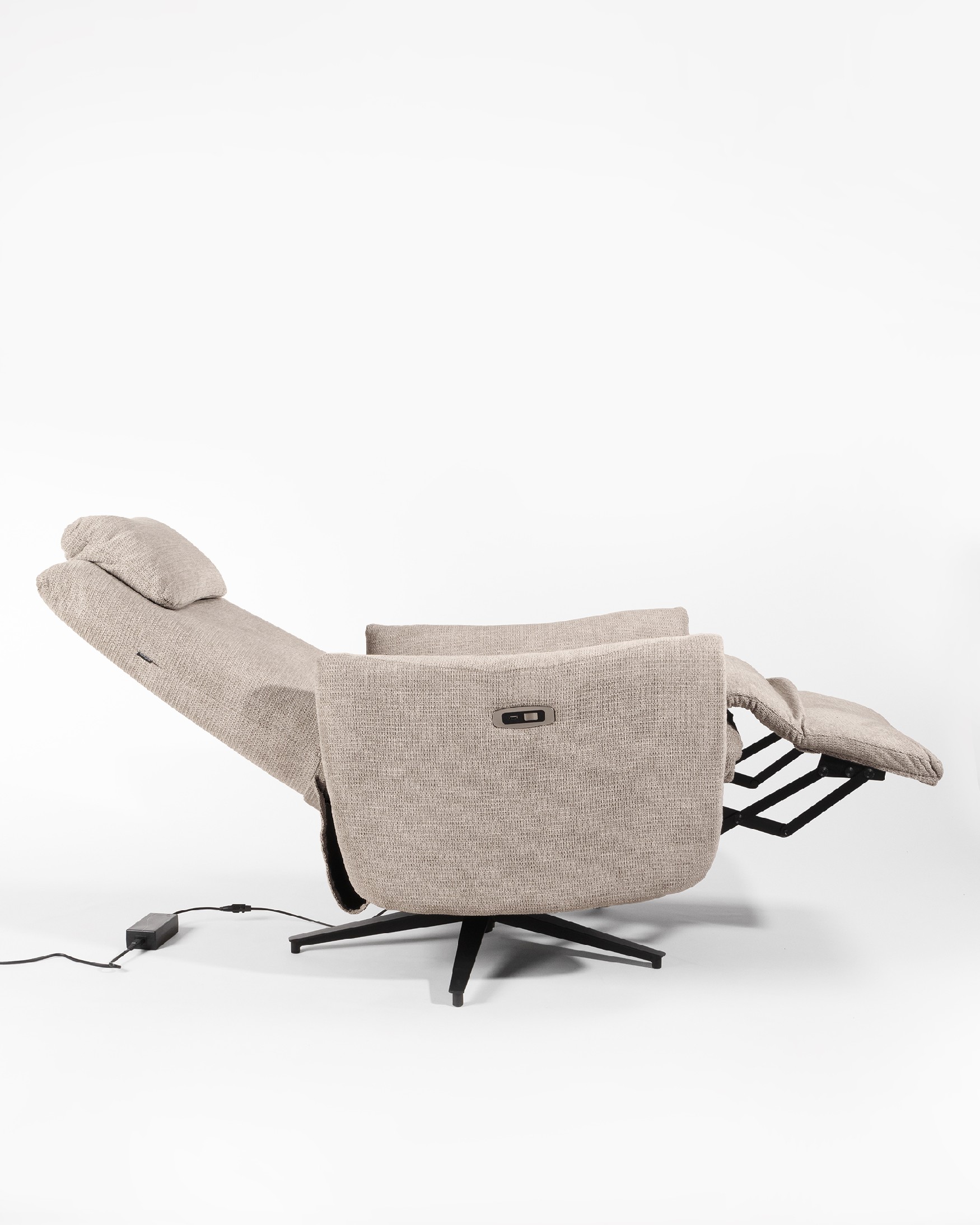 Megan electric swivel recliner with earth-colored upholstery and black metal base
