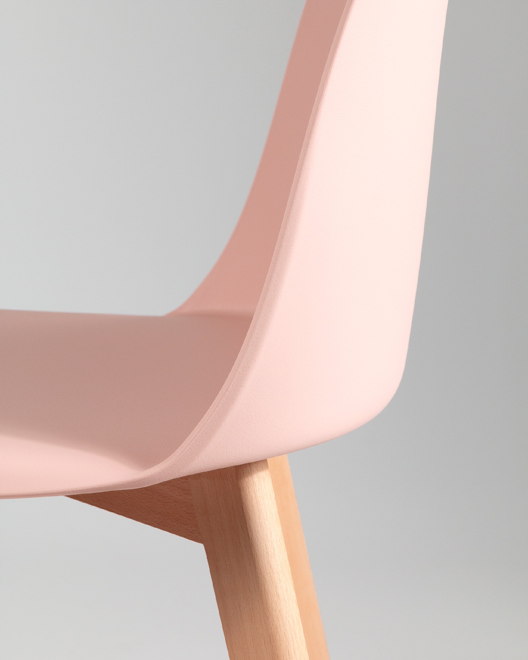 Miami chair with wooden legs and pink upholstery