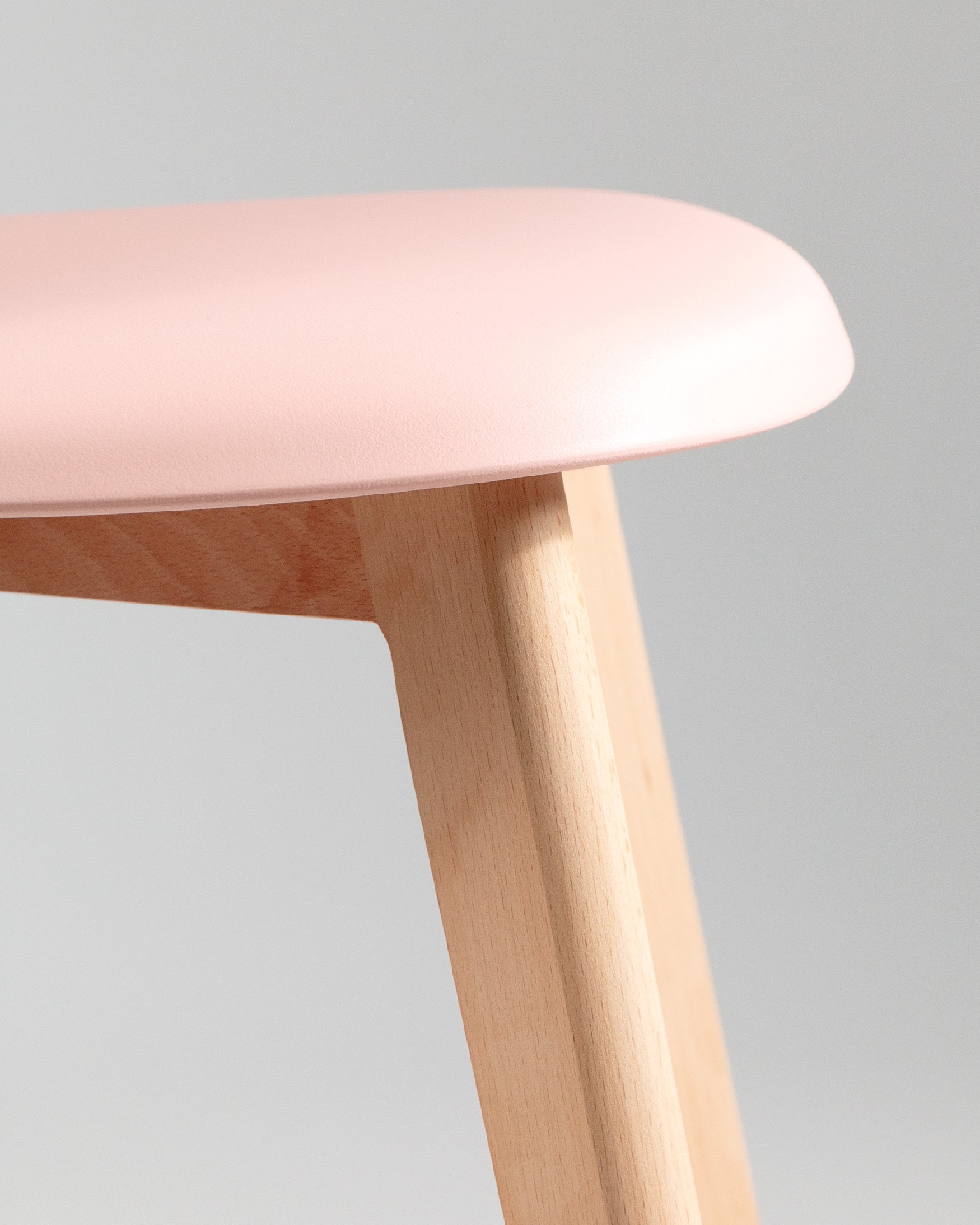 Miami chair with wooden legs and pink upholstery