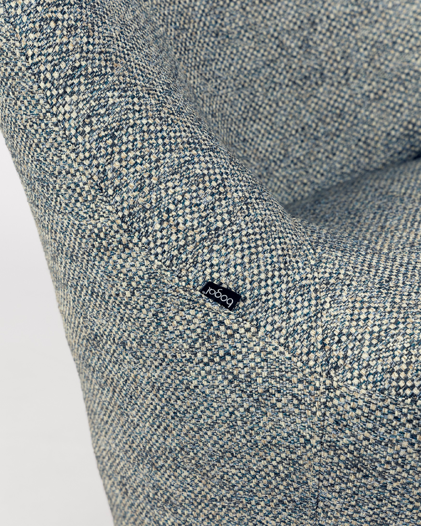 Fauteuil pivotant 360º Moma avec tapisserie bleue