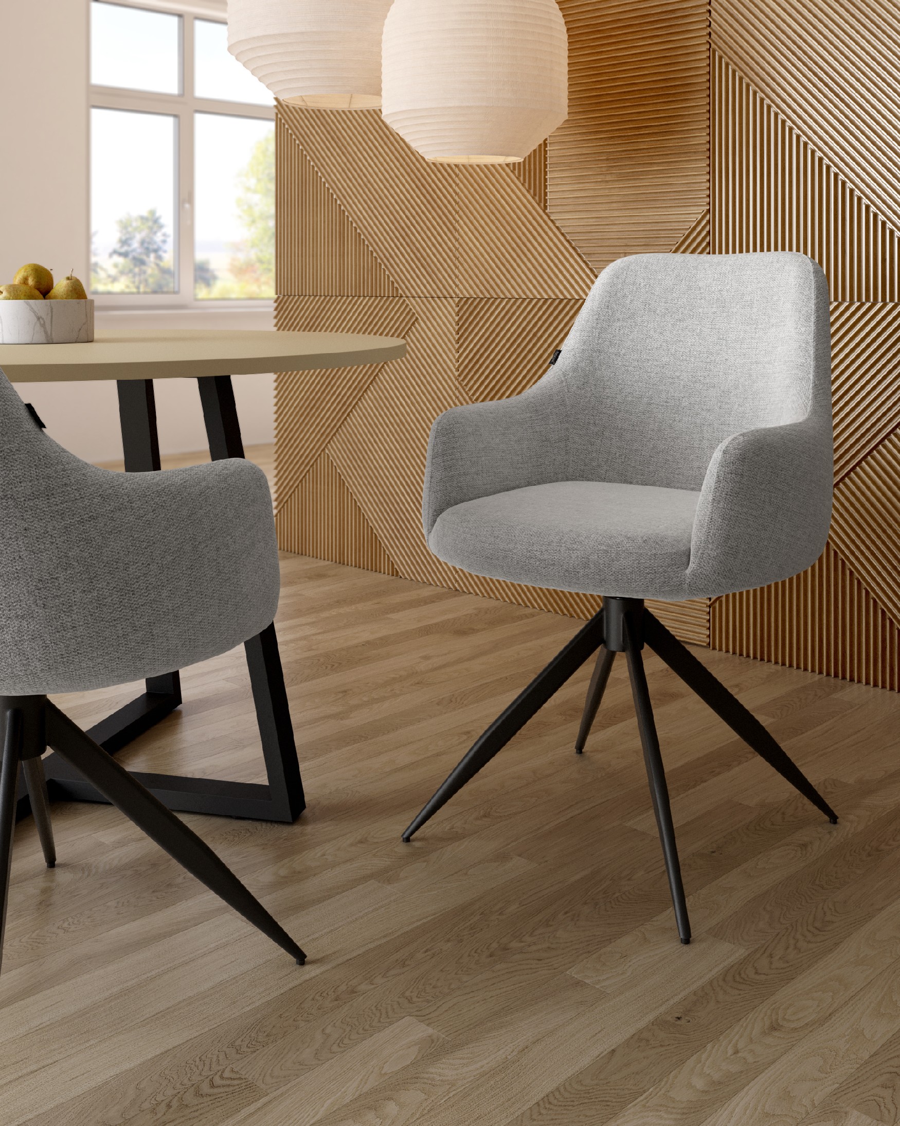 Silla Montreal giratoria 180º con función return, tapizado gris y patas metálicas negras