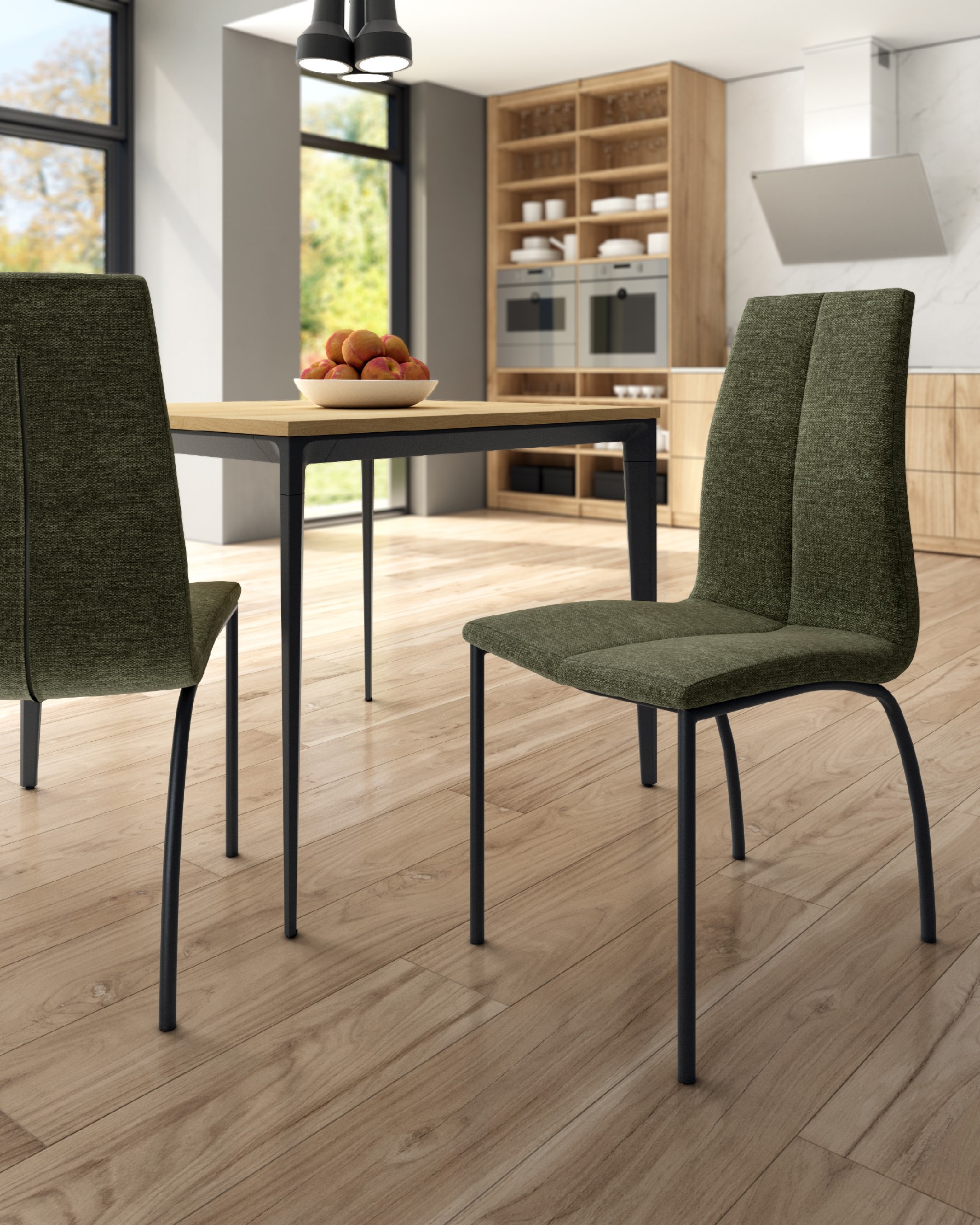Chaise Niza avec un revêtement vert et des pieds métalliques noirs