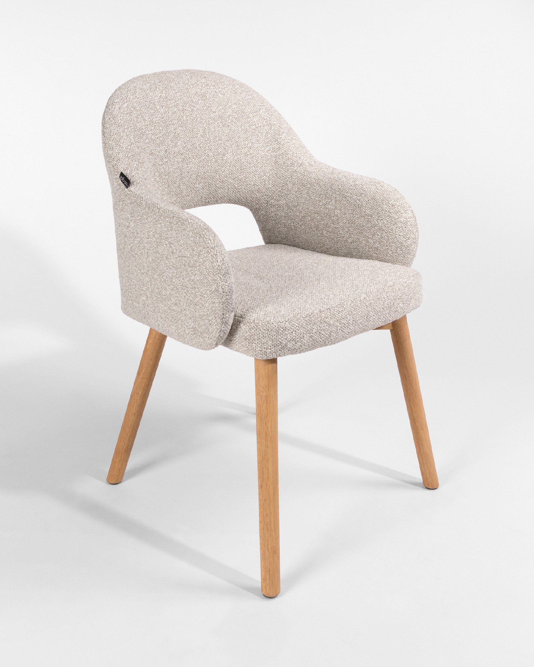 Ona chair with sand upholstery and oak legs