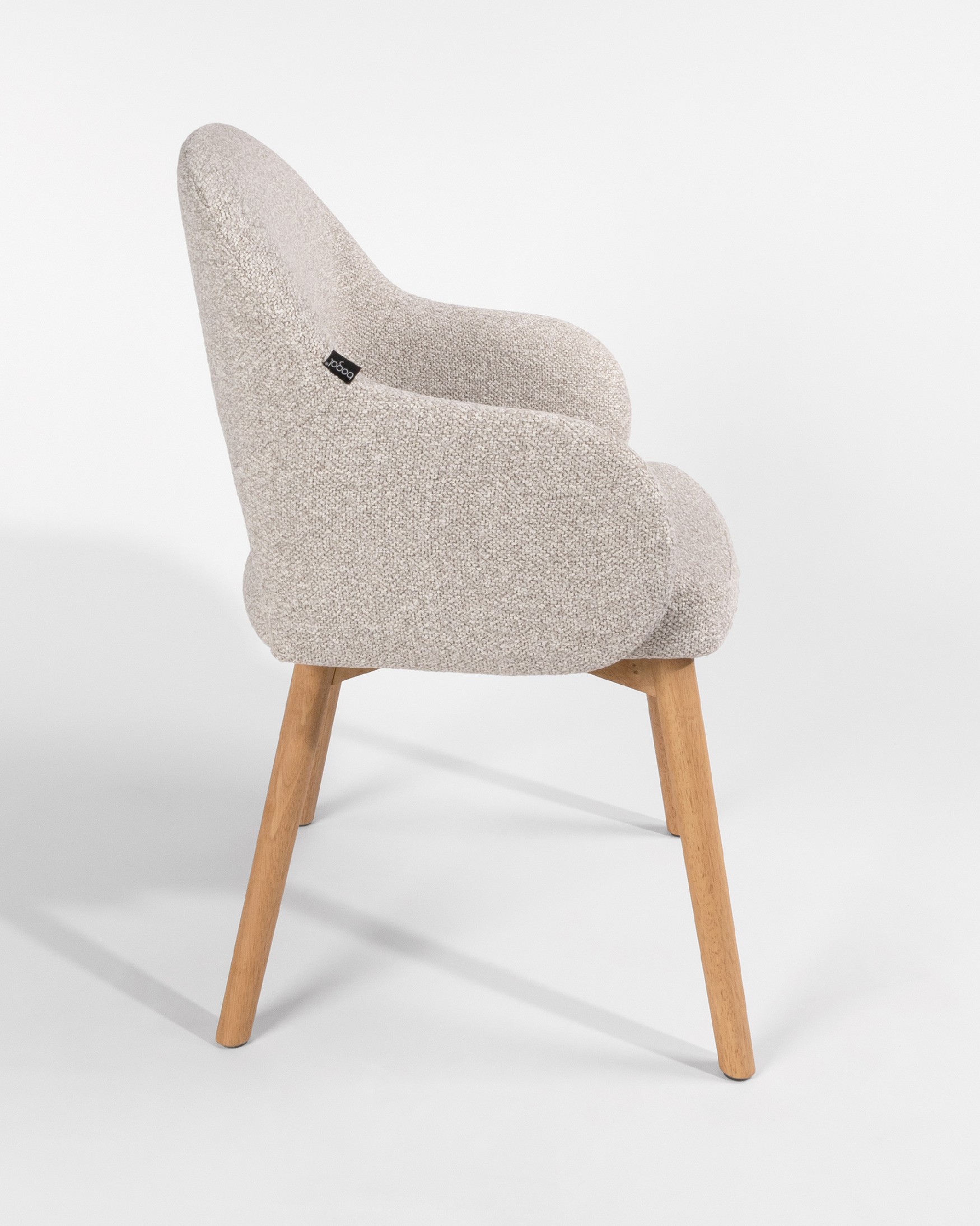 Ona chair with sand upholstery and oak legs
