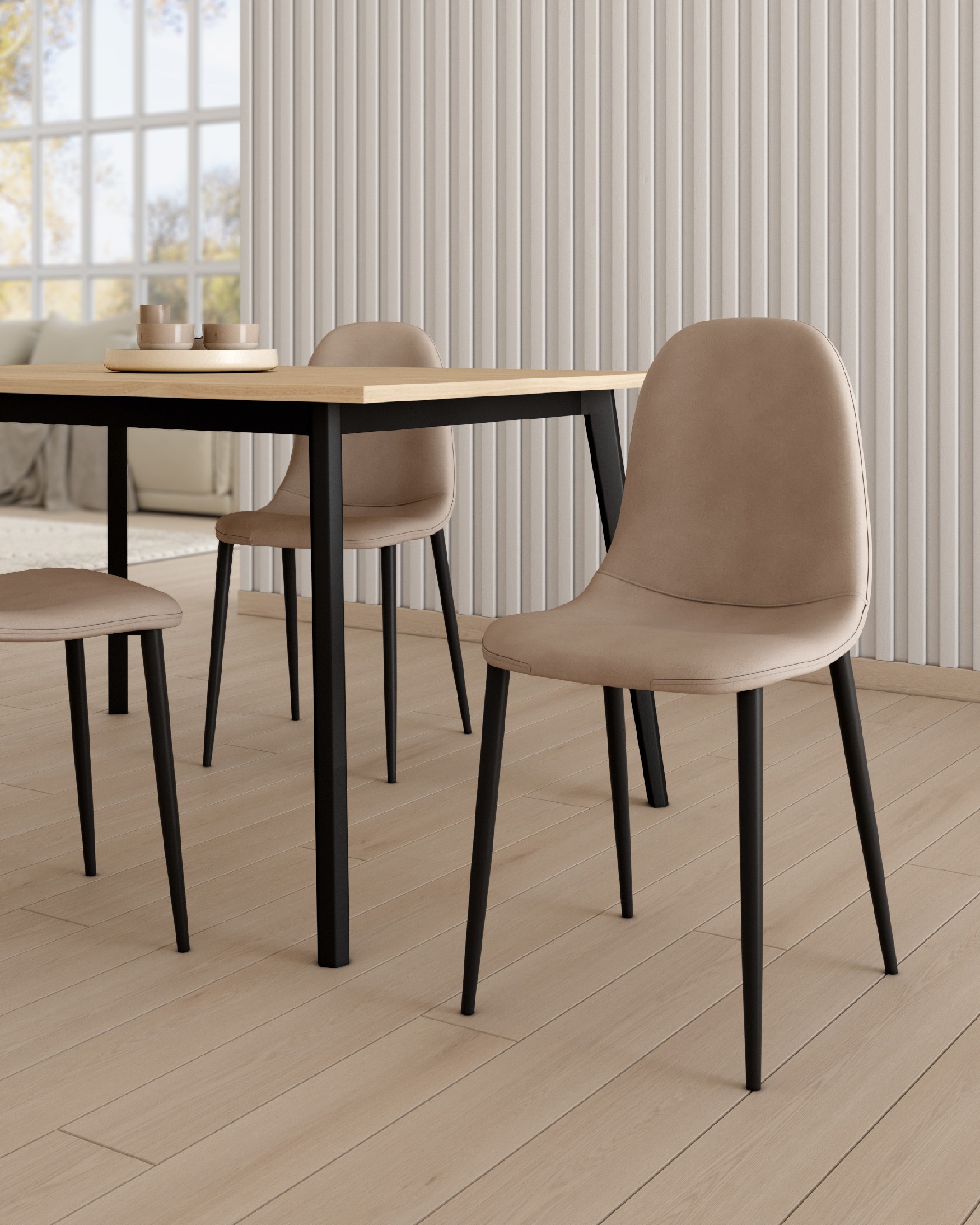 Oporto chair with beige upholstery and black metal legs