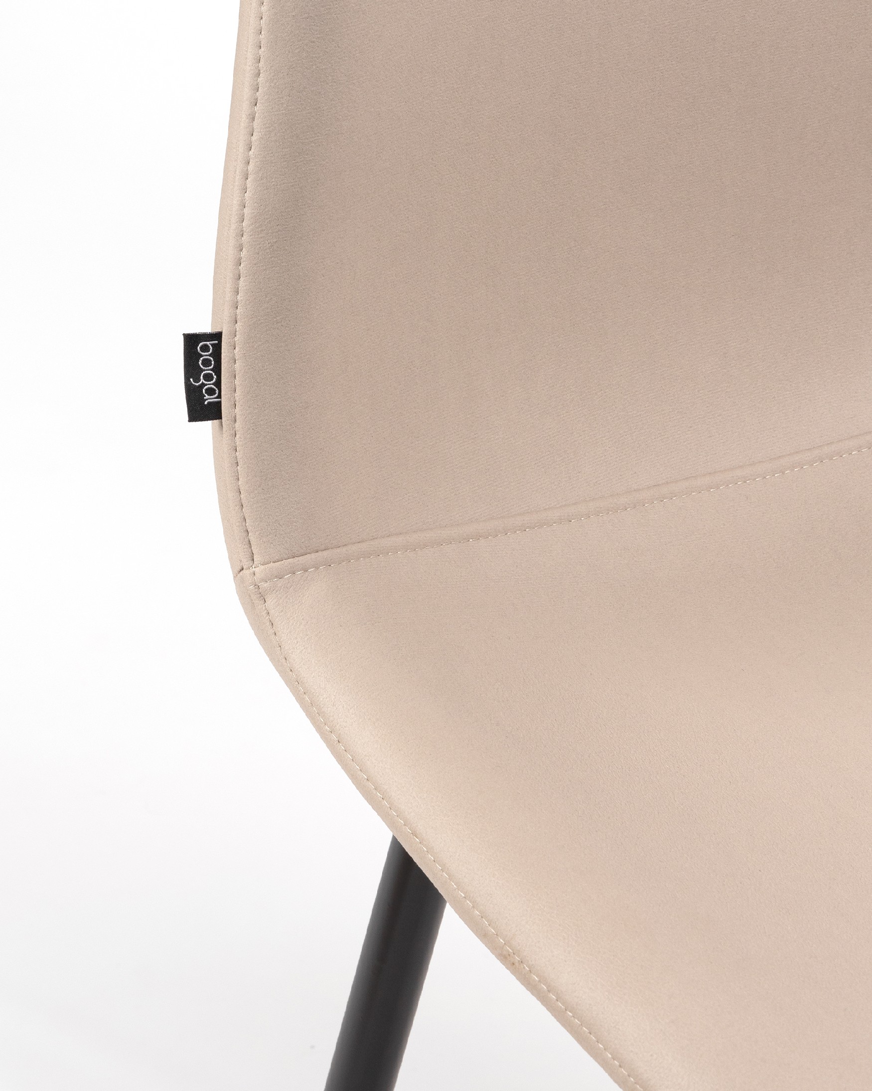 Oporto chair with beige upholstery and black metal legs