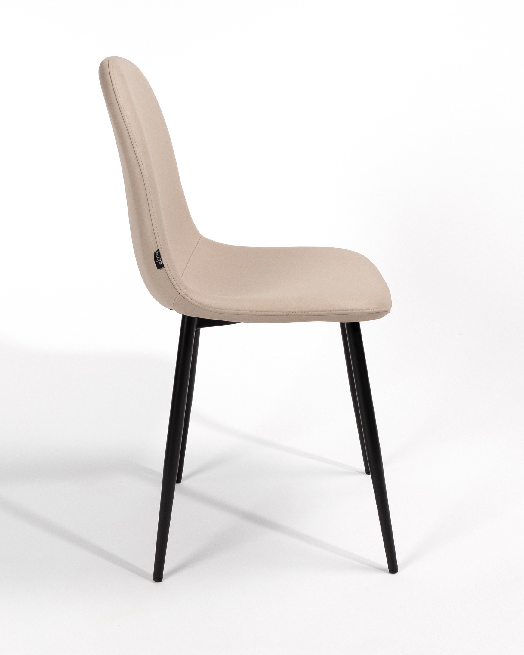 Oporto chair with beige upholstery and black metal legs