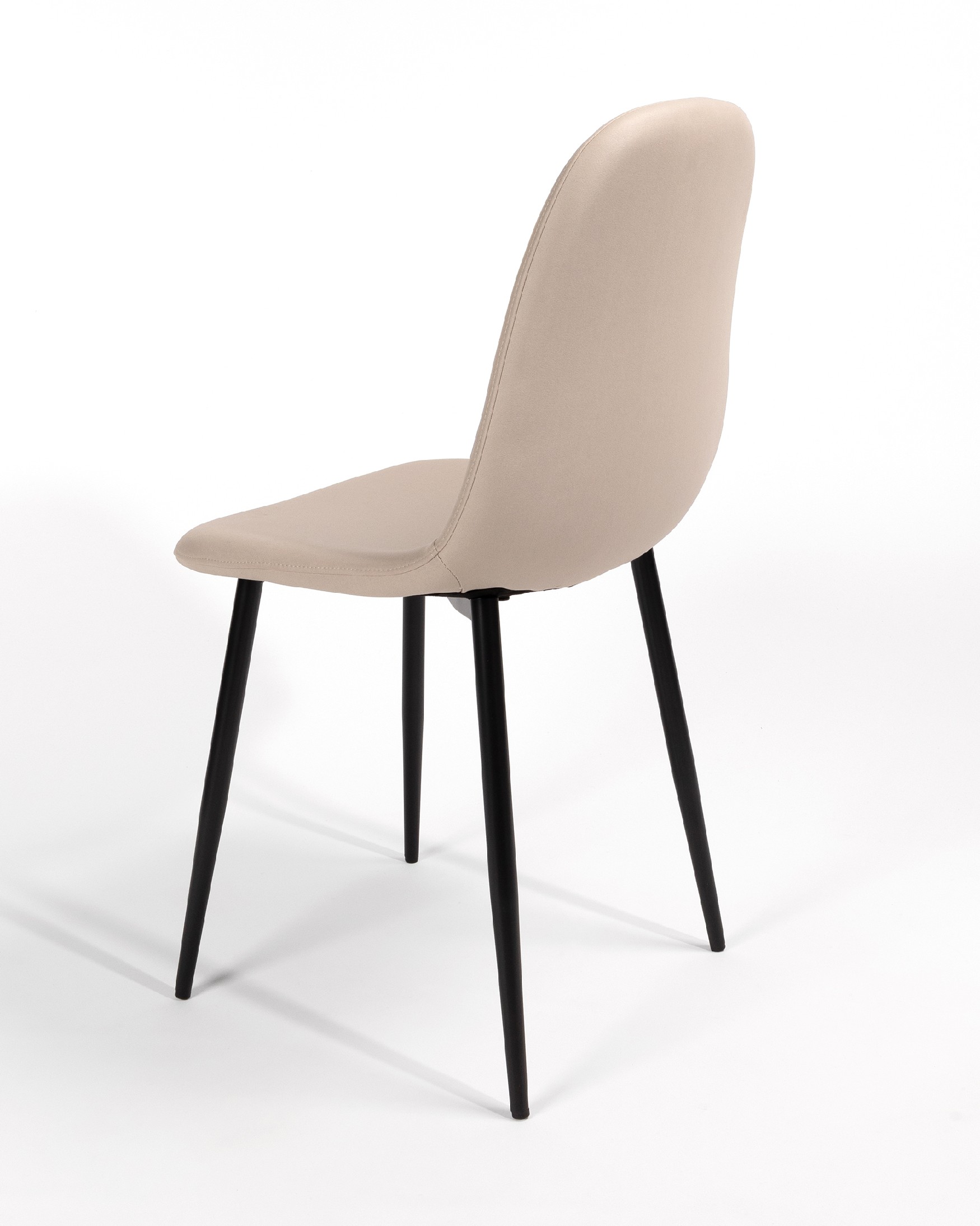 Oporto chair with beige upholstery and black metal legs