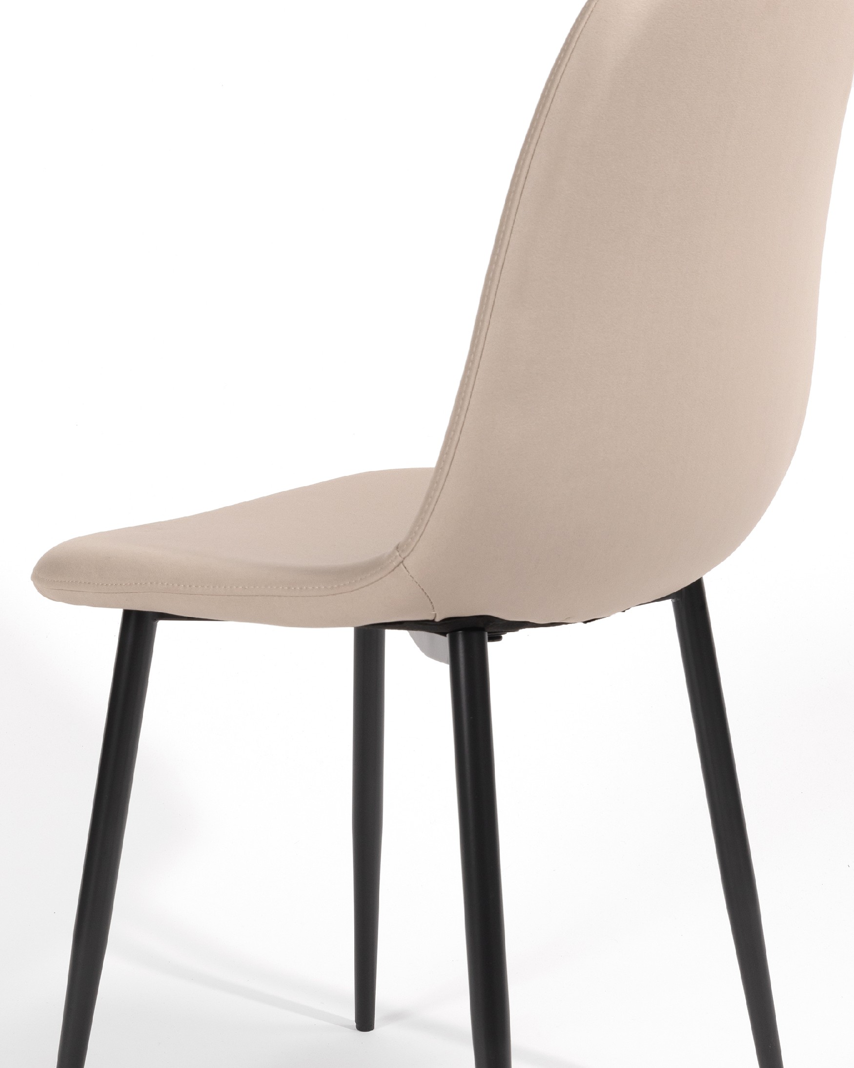 Oporto chair with beige upholstery and black metal legs