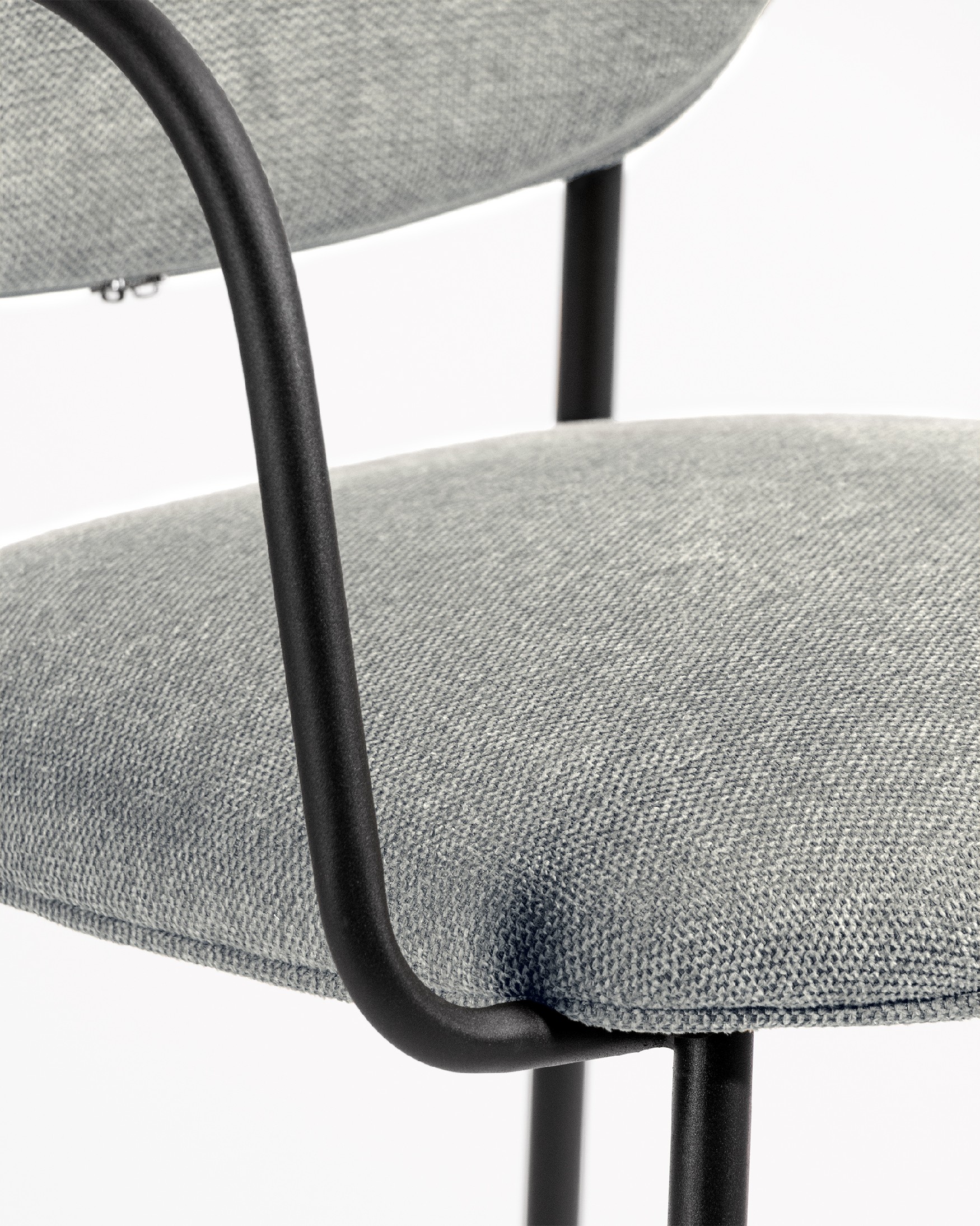 Osaka chair with gray upholstery and black metal legs