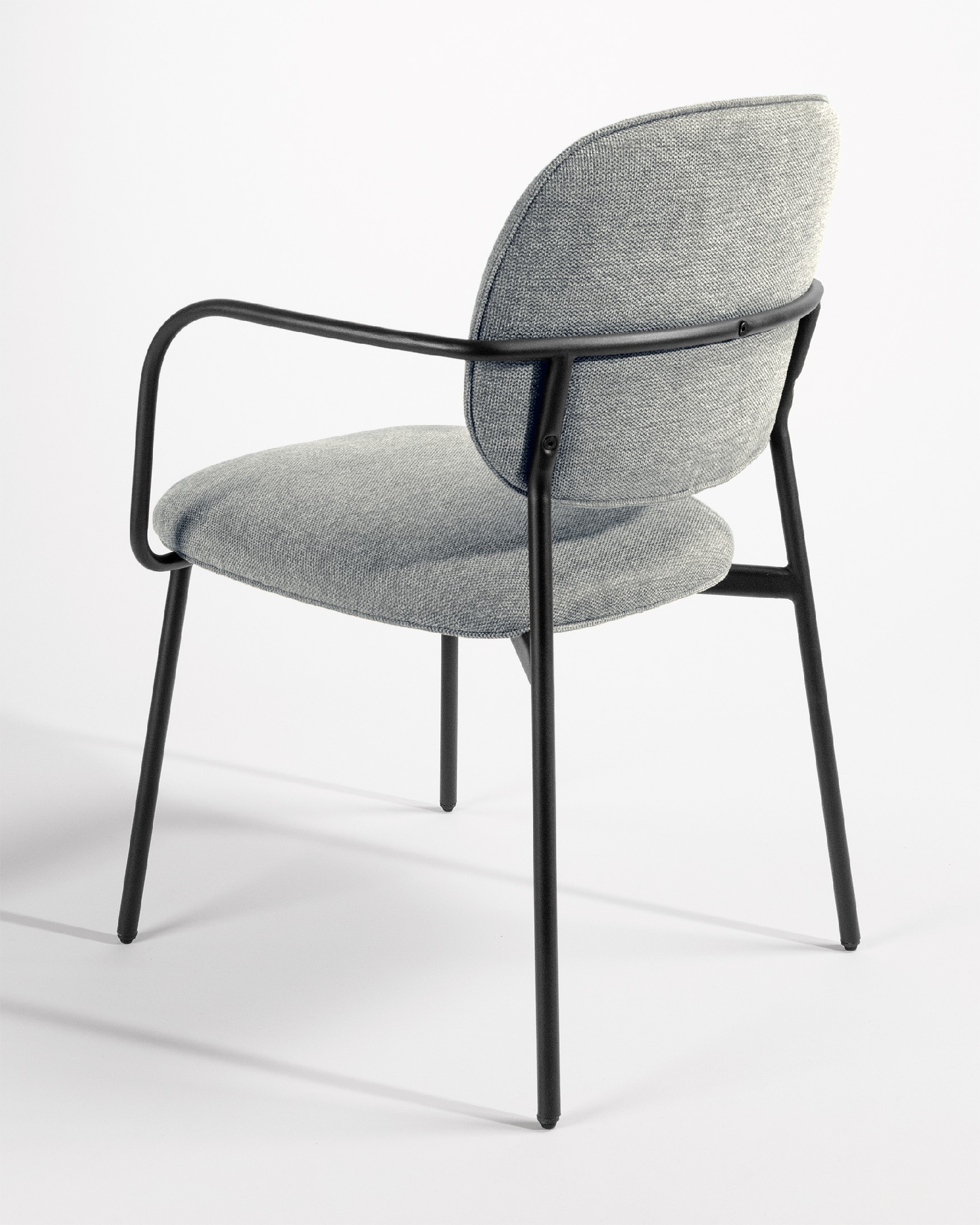 Osaka chair with gray upholstery and black metal legs