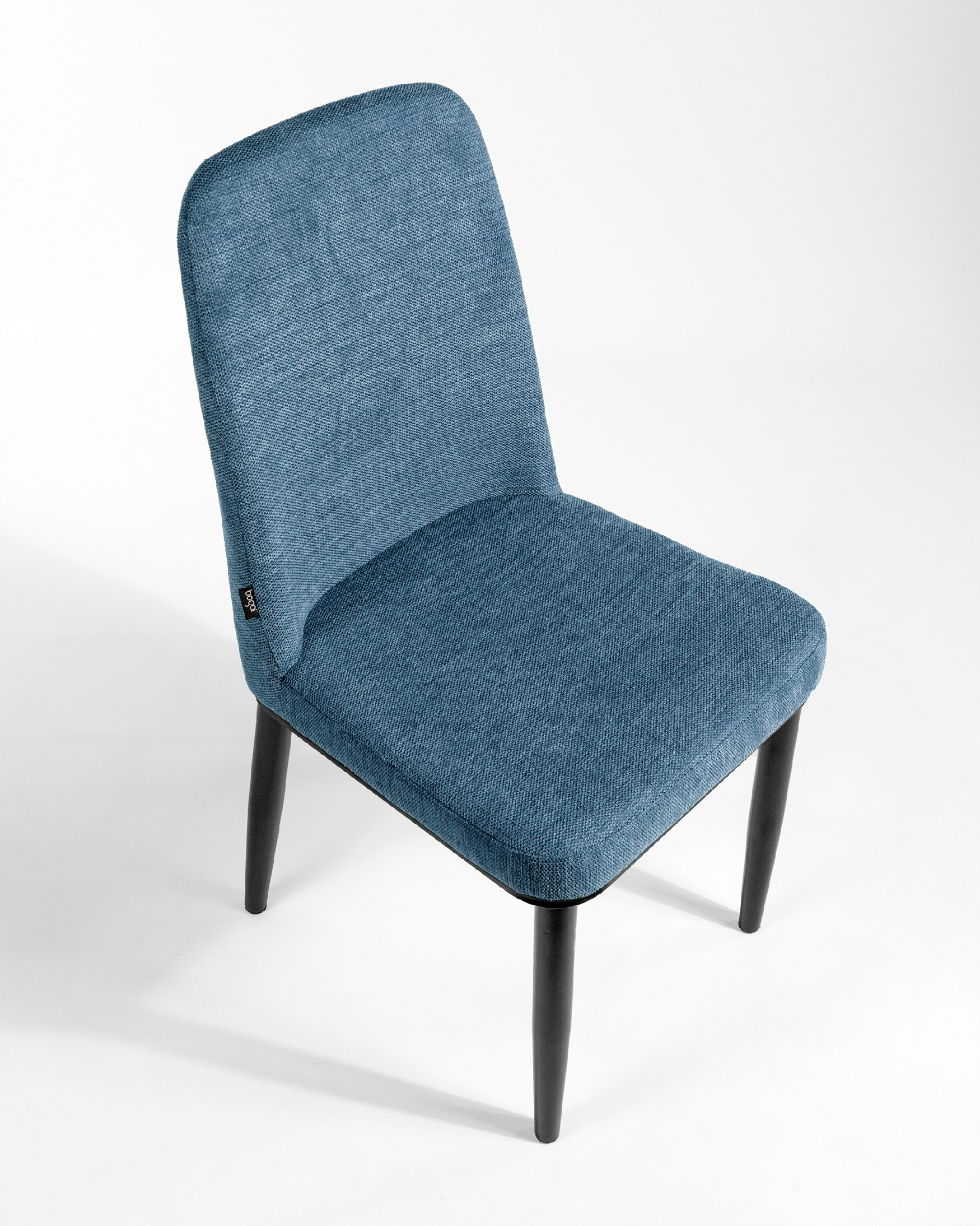 Oslo chair with blue upholstery and black legs