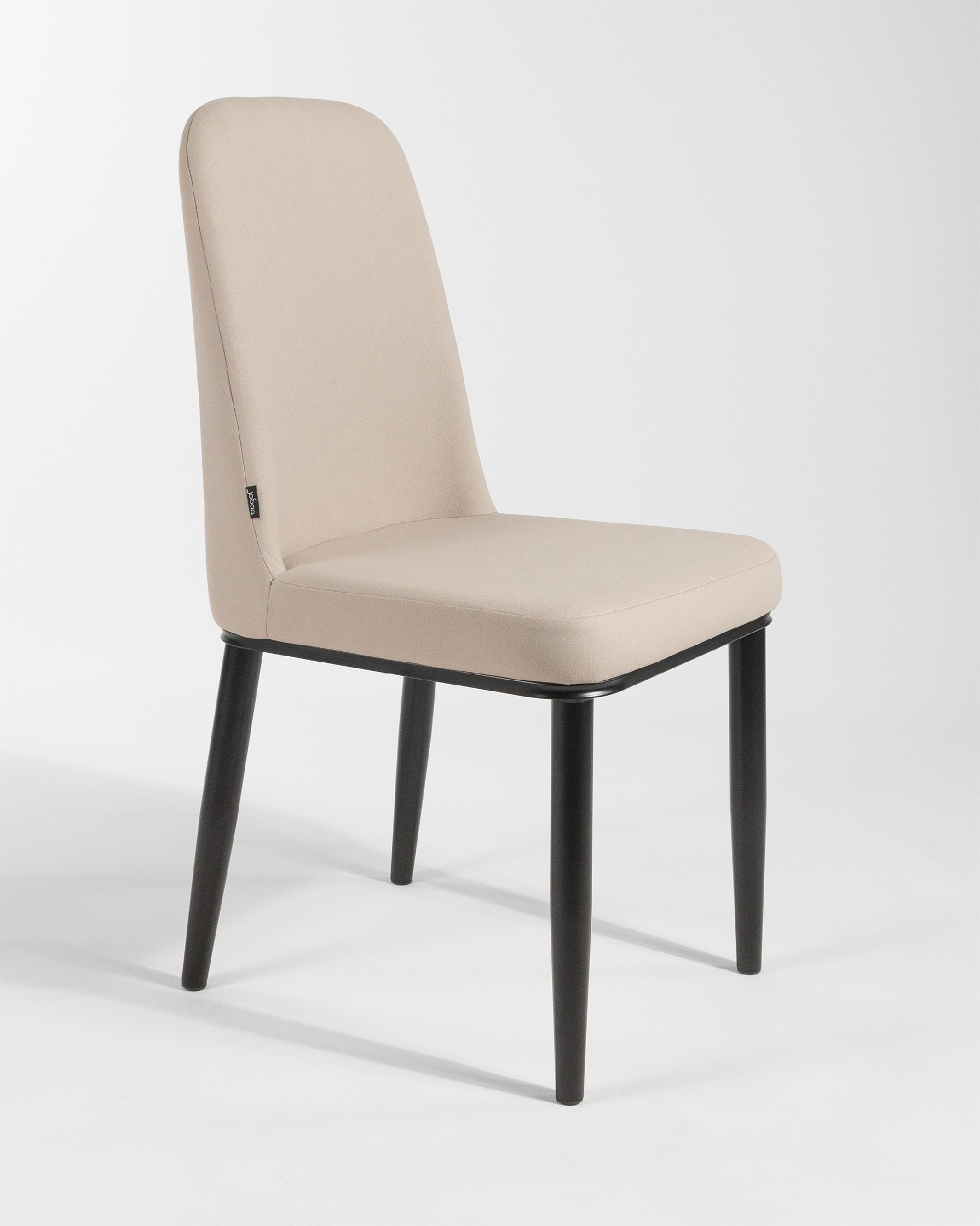 Oslo chair with beige upholstery and black legs