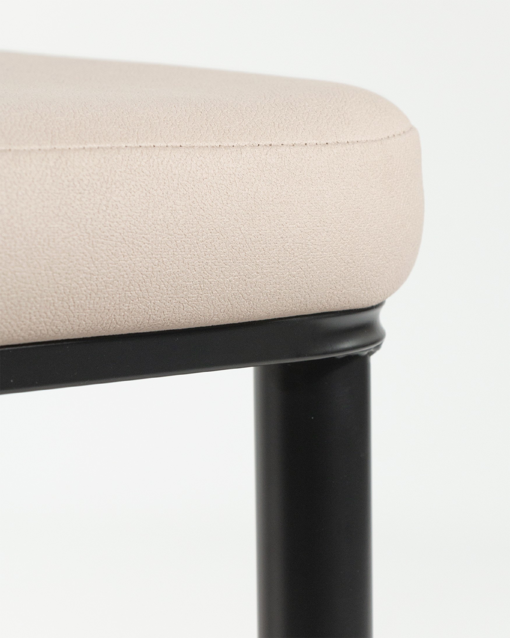 Oslo chair with beige upholstery and black legs
