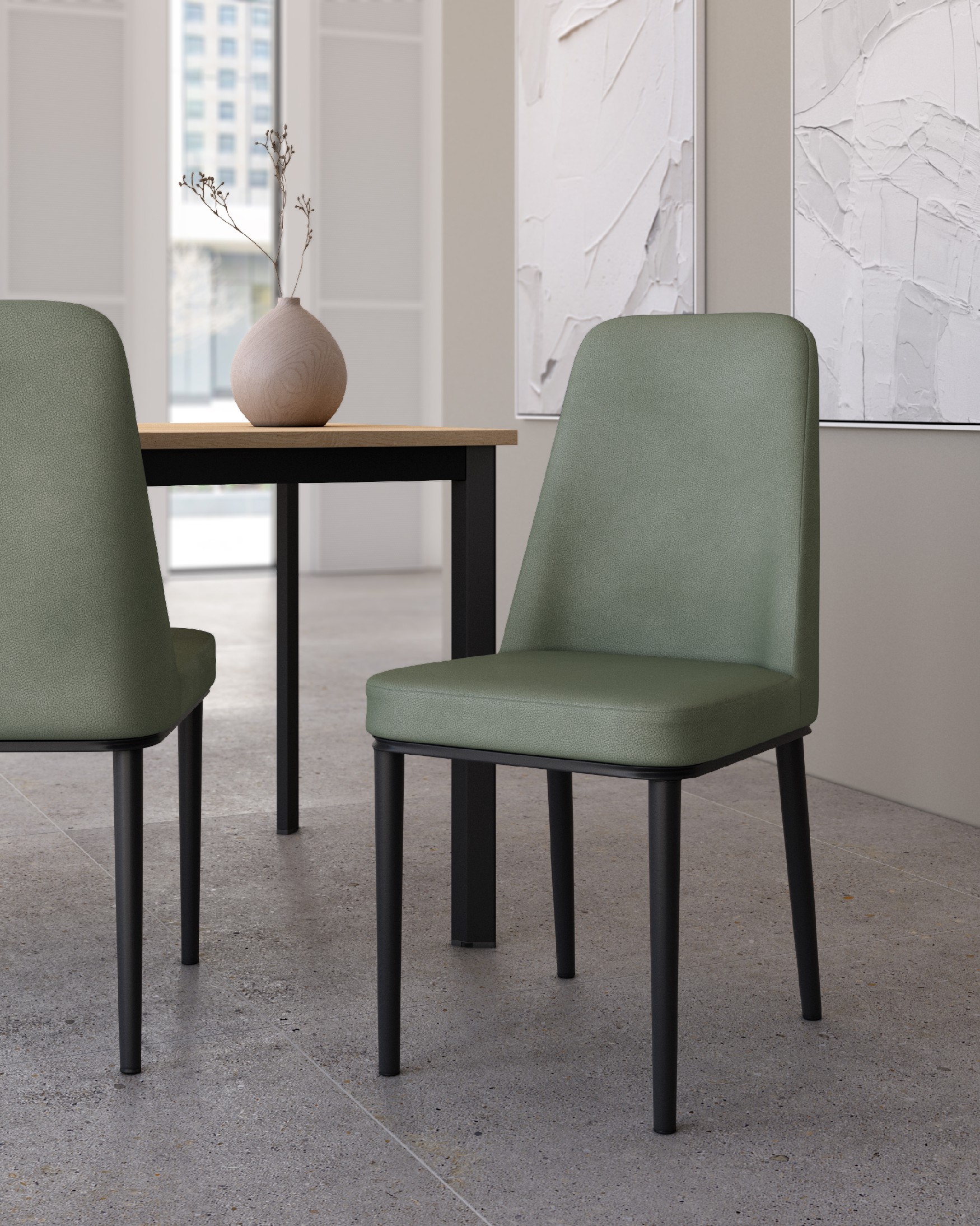 Oslo chair with moss upholstery and black legs