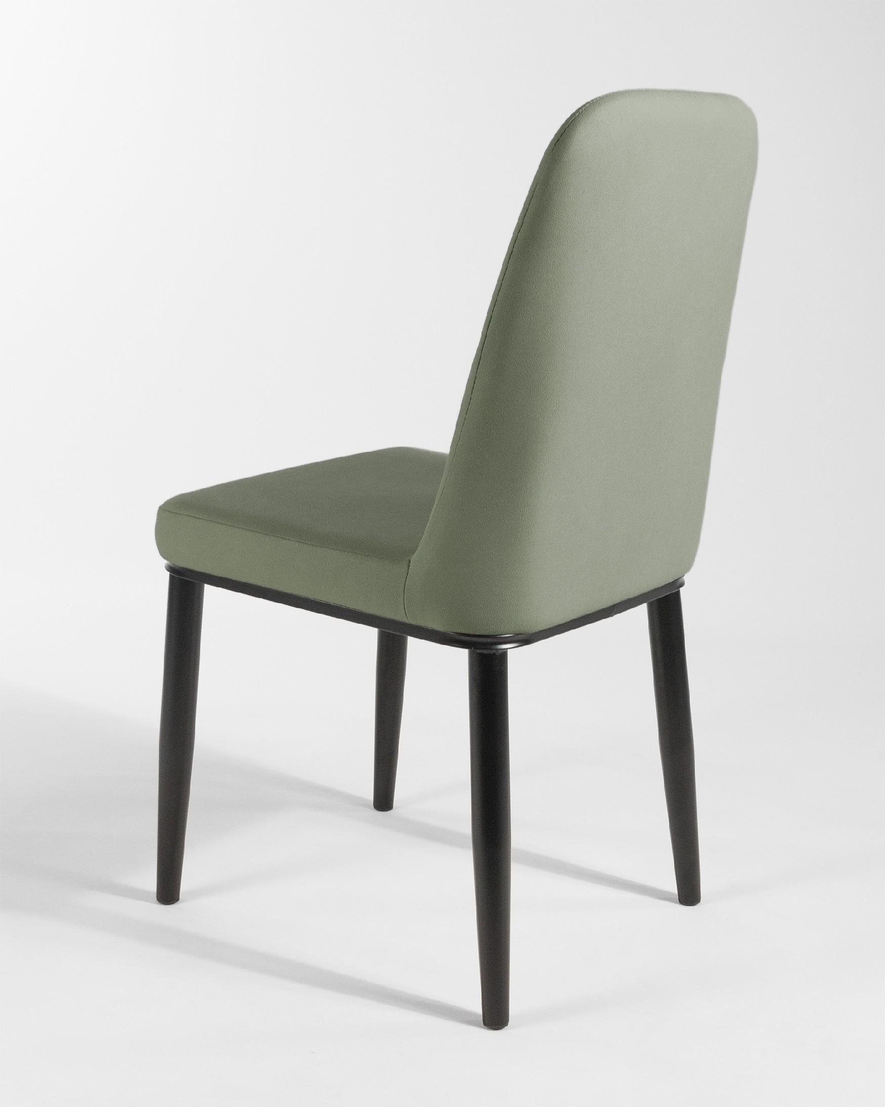 Oslo chair with moss upholstery and black legs