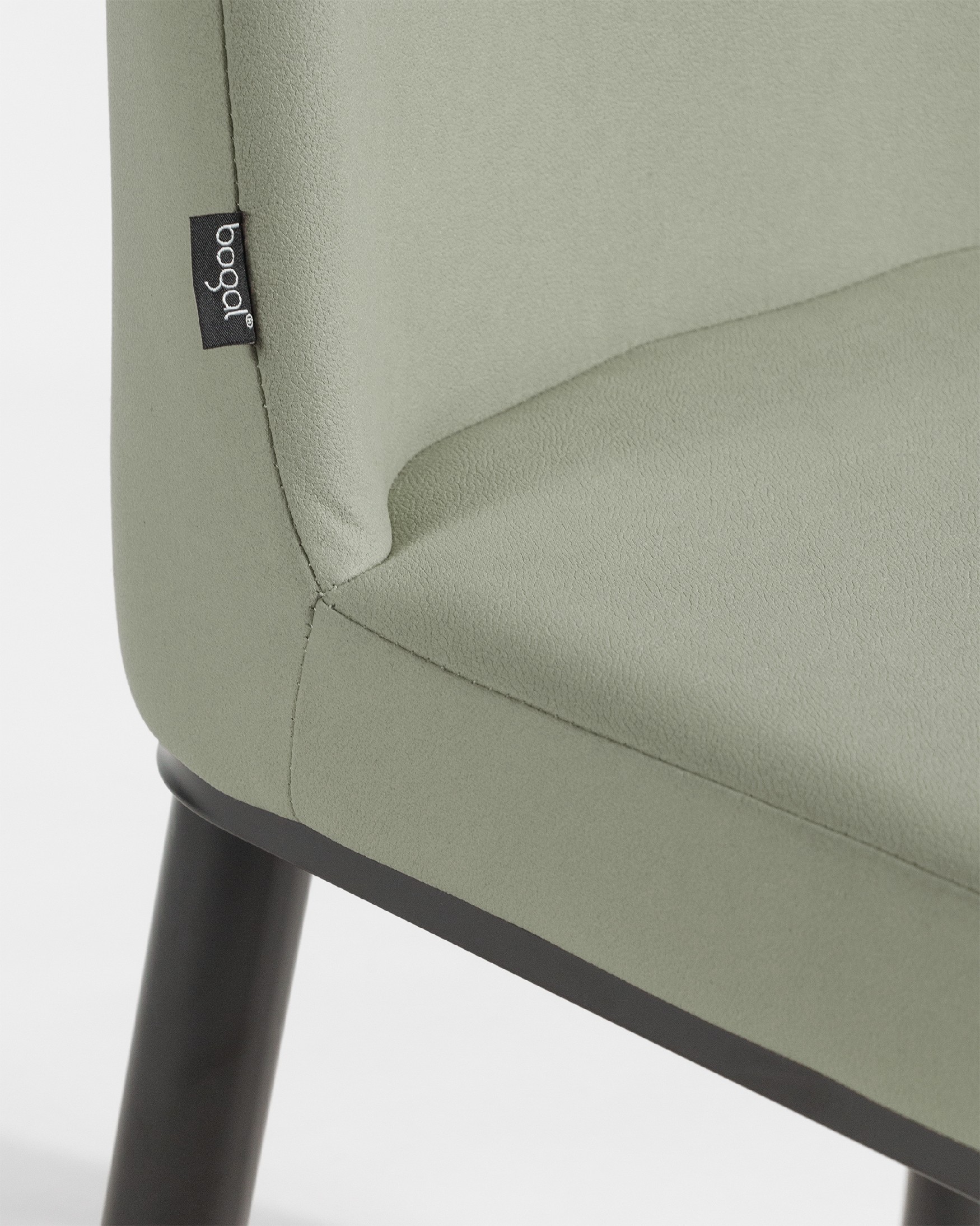 Oslo chair with moss upholstery and black legs
