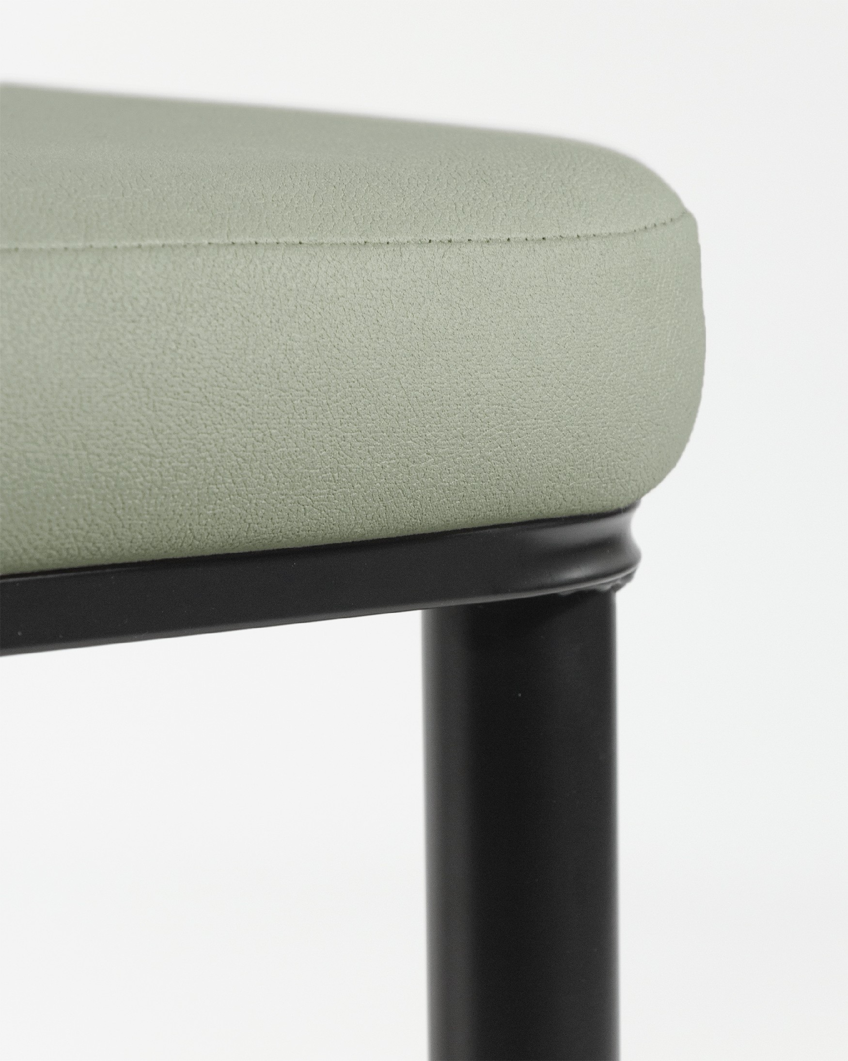 Oslo chair with moss upholstery and black legs