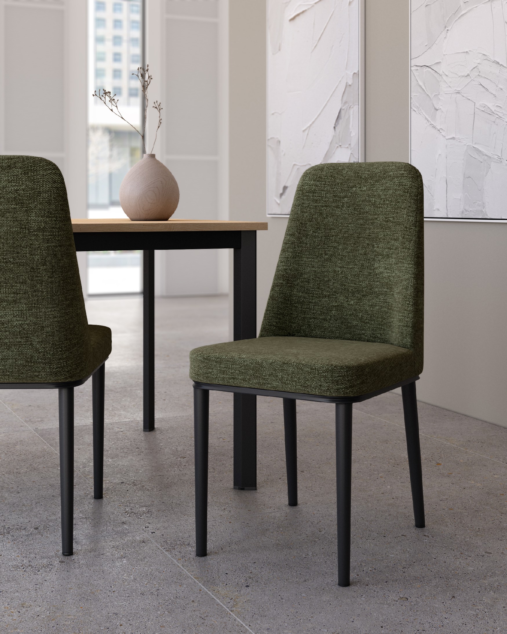 Silla Oslo con tapizado verde y patas negras